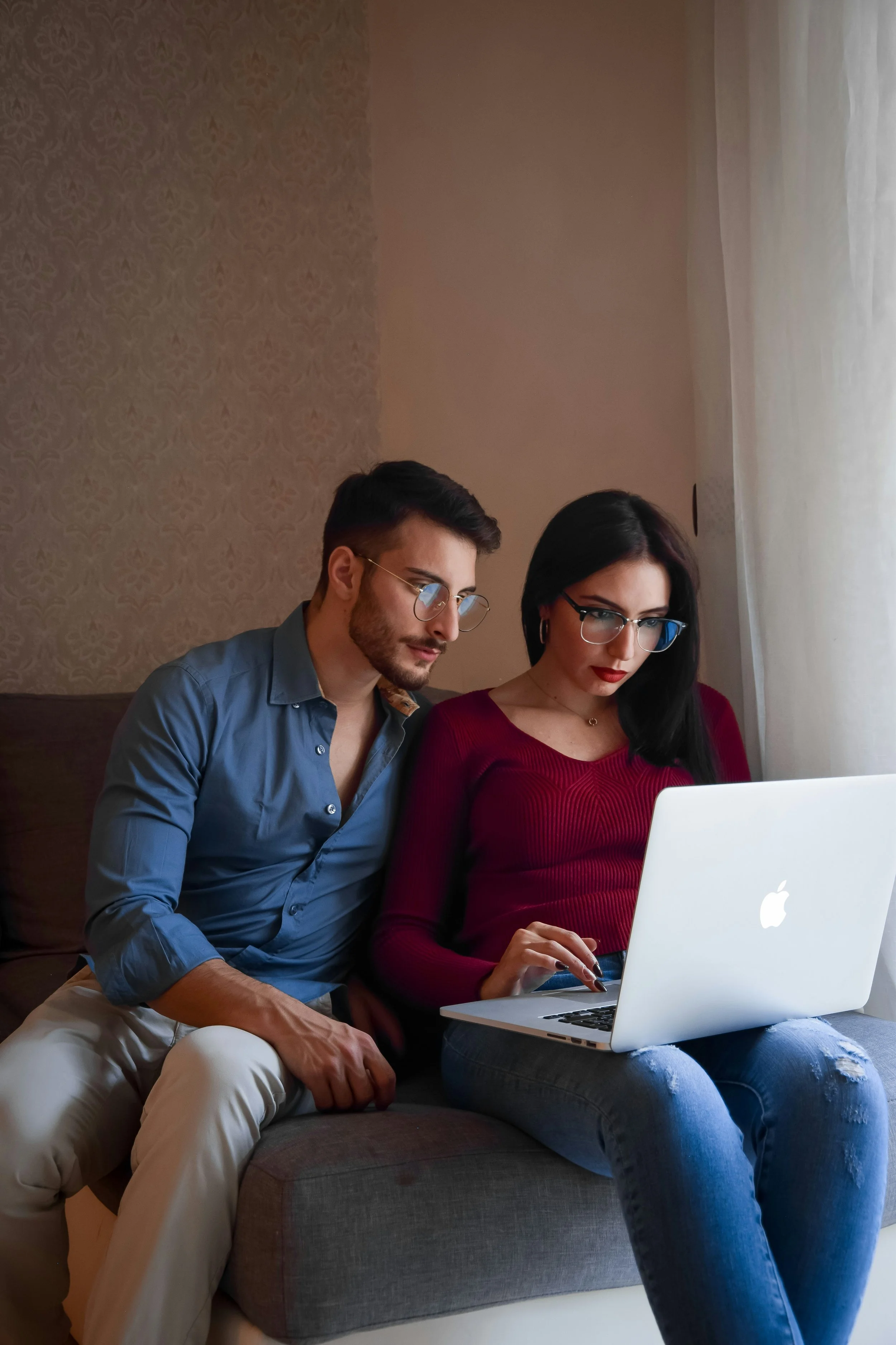 A couple parenting children with ADHD, autism, and PDA search for therapy support.