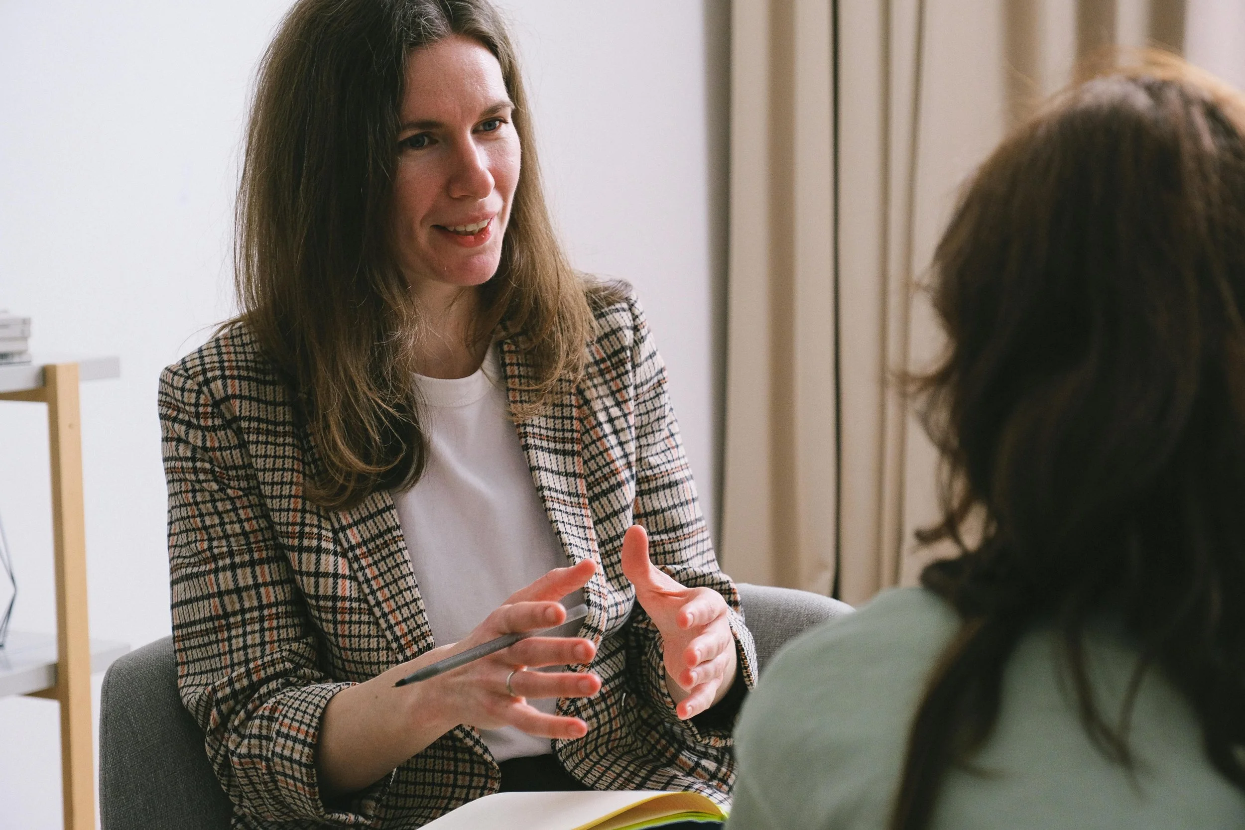 A woman with ADHD or autism in a therapy session.