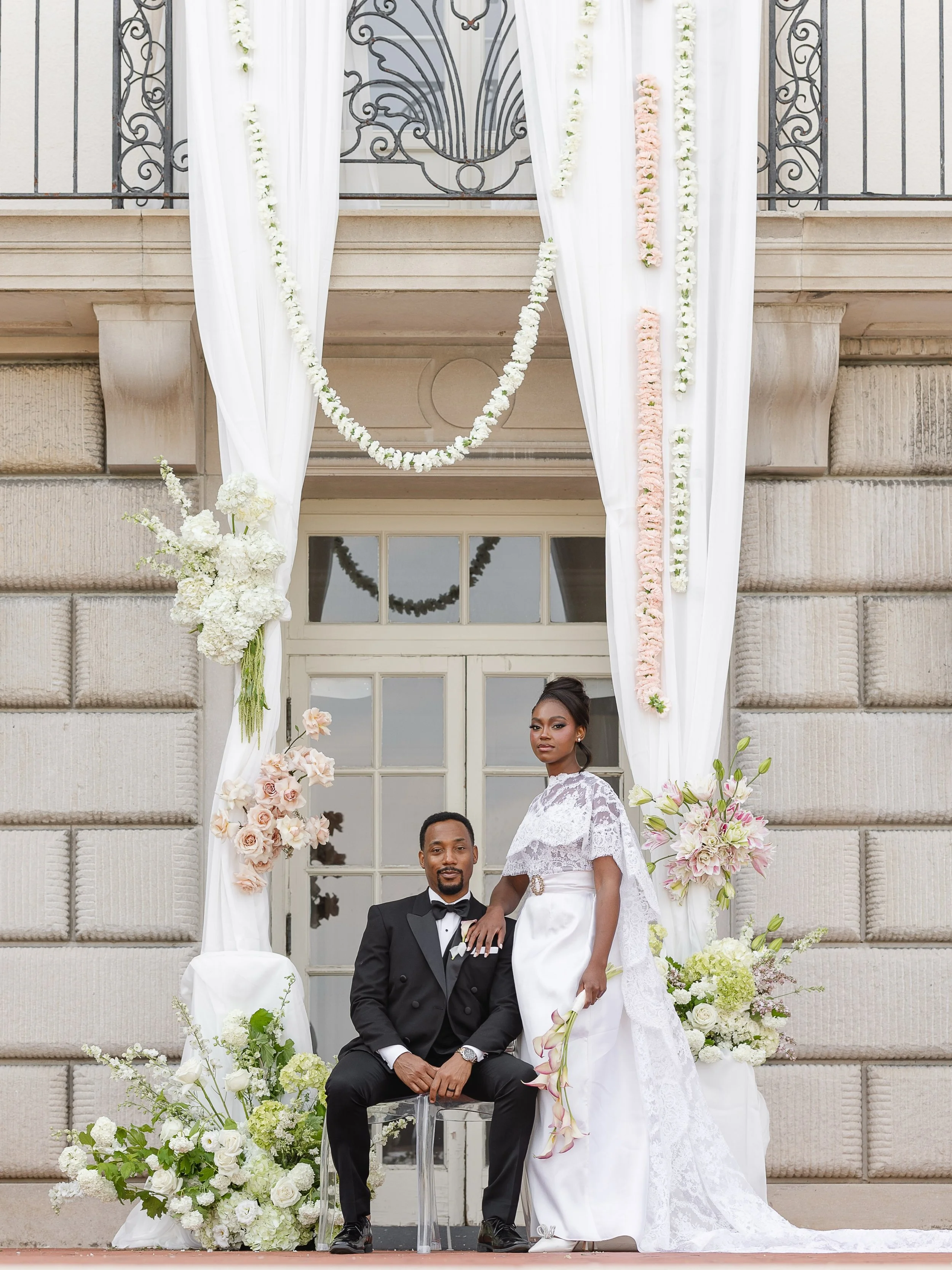 Pink peonies popping open in the sunshine,  catching the scent of rose lilies in the breeze, long strands of floral garland hanging from the back balcony and clusters of flower clouds floating on drapery. What a dream. 

I had so much fun playing wit