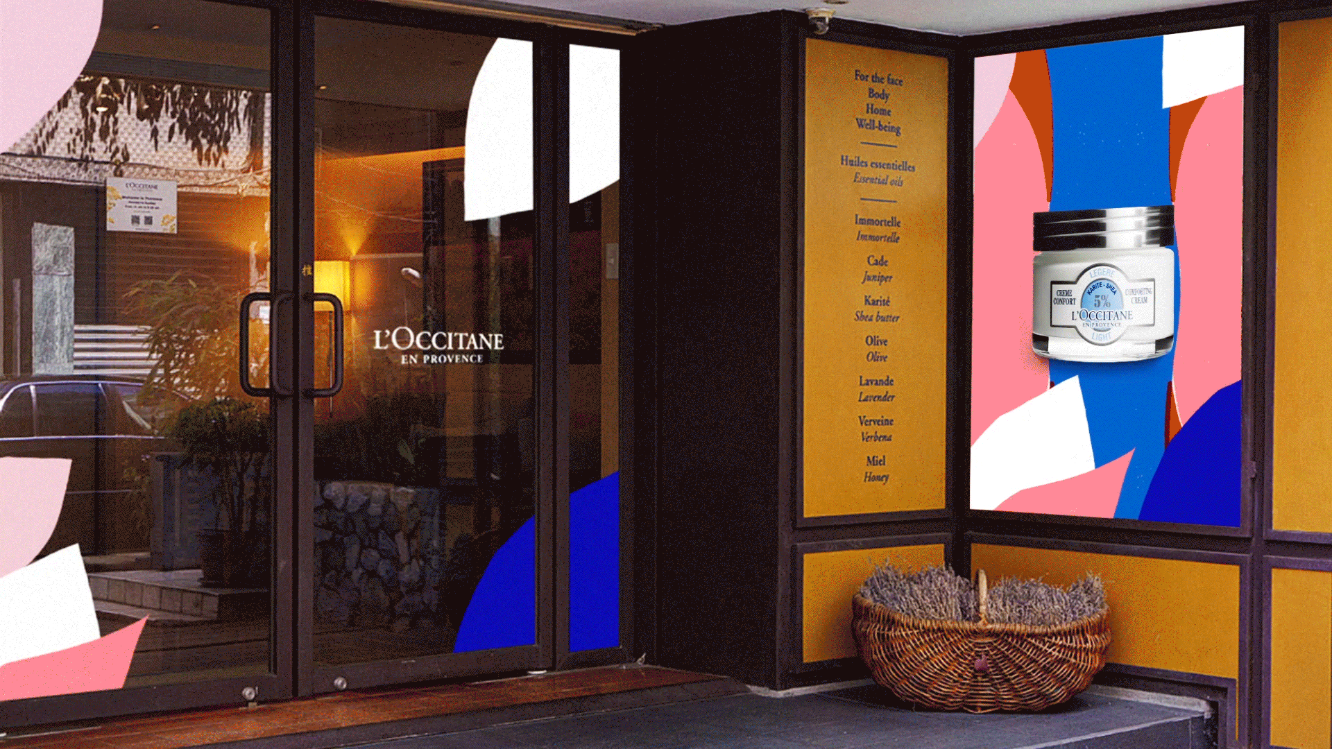 Vitrine d'une boutique avec une publicité pour la crème de soin de La Roche-Posay, un panneau avec une liste d'huiles essentielles et un pot de crème L'Occitane. La vitrine porte la marque L'Occitane en Provence.