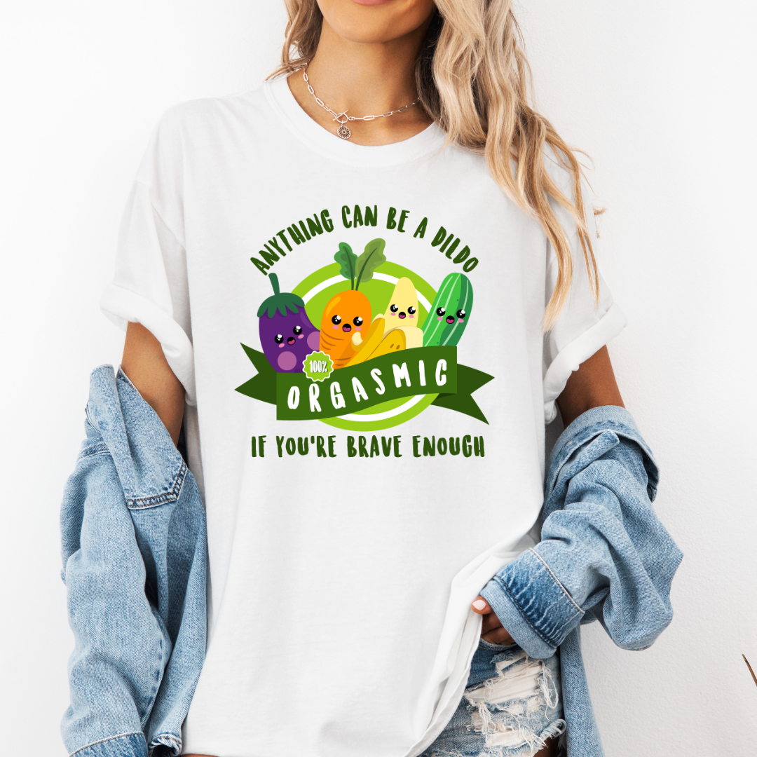 female Model wearing a white Orgasmic Veggies funny graphic t-shirt, showcasing the bold design and comfortable fit from Coffee and Moo.