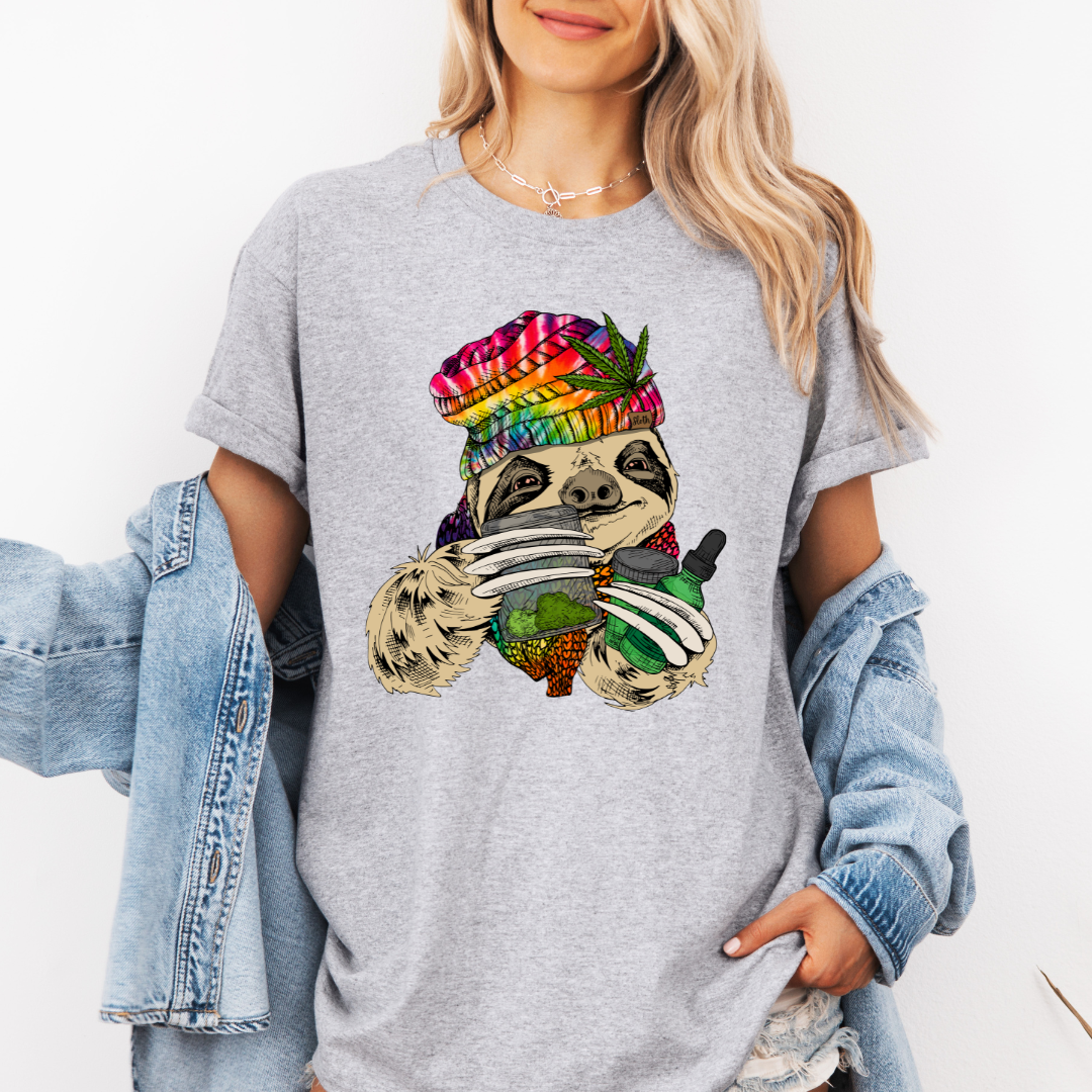 Female Model wearing a grey Chill Stoner Sloth soft graphic t-shirt, showcasing its unique design and comfortable fit from Coffee and Moo.