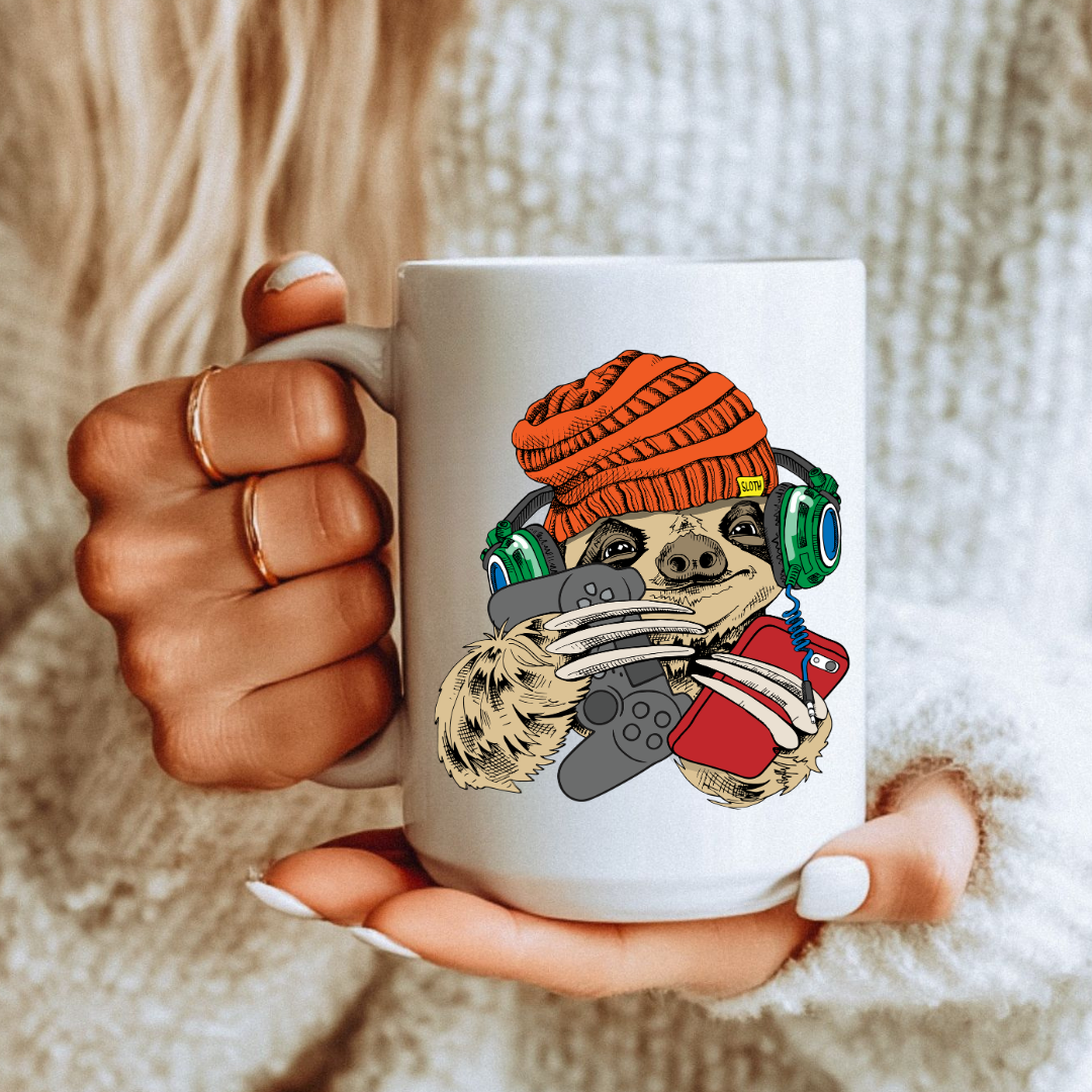 Female holding Gamer Sloth unique coffee mug, highlighting the gaming sloth design, from Coffee and Moo.