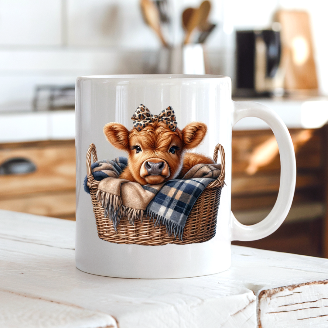 Cute Highland Cow Basket Mug funny coffee mug on a country kitchen bench, adding humour to a rustic setting, by Coffee and Moo.