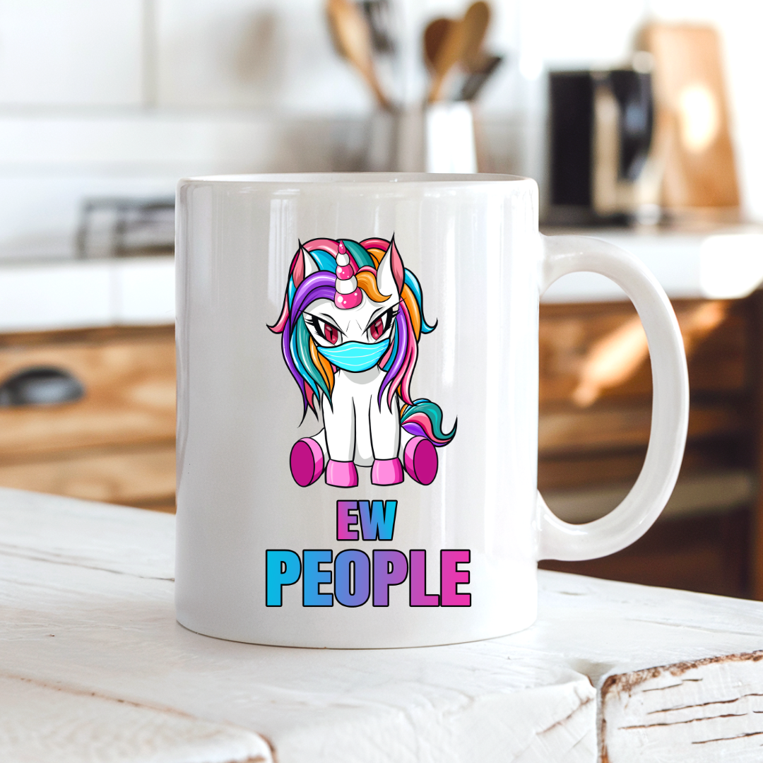 Ew People Unicorn funny coffee mug on a country kitchen bench, adding humour to a rustic setting, by Coffee and Moo.