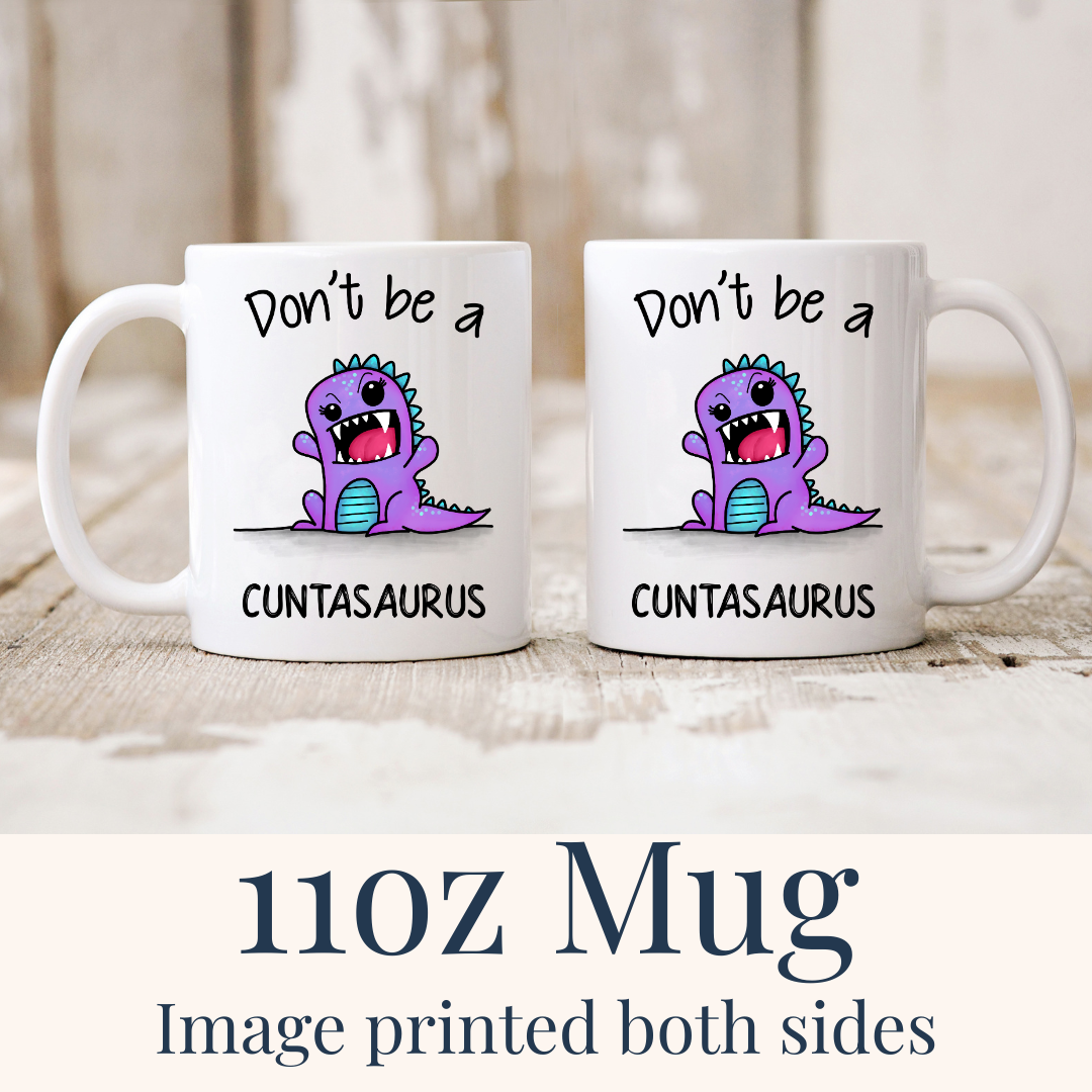 11oz Cuntasaurus ceramic mug, with the angry purple dinosaur design visible on both sides, from Coffee and Moo.