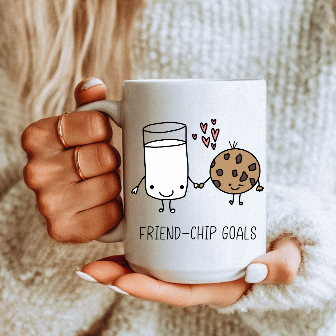 Female holding Friend-chip Goals unique gift mug, highlighting the wholesome bestie design, from Coffee and Moo.