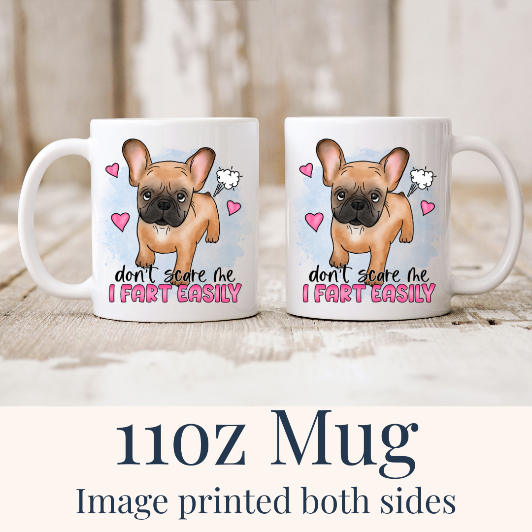11oz Don’t Scare Me I Fart Easily French Bulldog ceramic mugs, with the "Don’t scare me I fart easily" design visible on both sides, from Coffee and Moo.