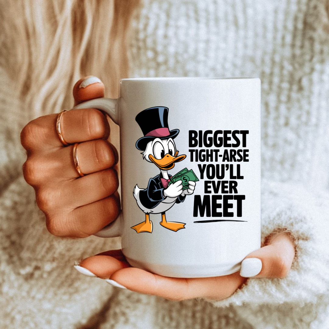 Female holding 15oz Biggest Tight-Arse Funny Duck unique coffee mug, highlighting the "Biggest tight-arse you’ll ever meet" design, from Coffee and Moo.