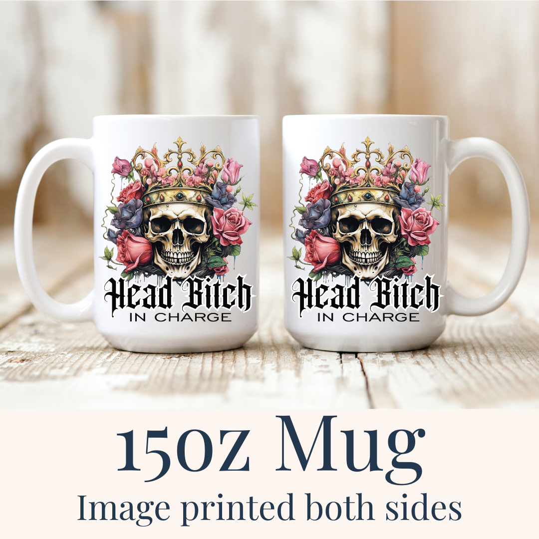 15oz Head Bitch In Charge ceramic mug, highlighting the intricate crown details and vibrant floral art, from Coffee and Moo.