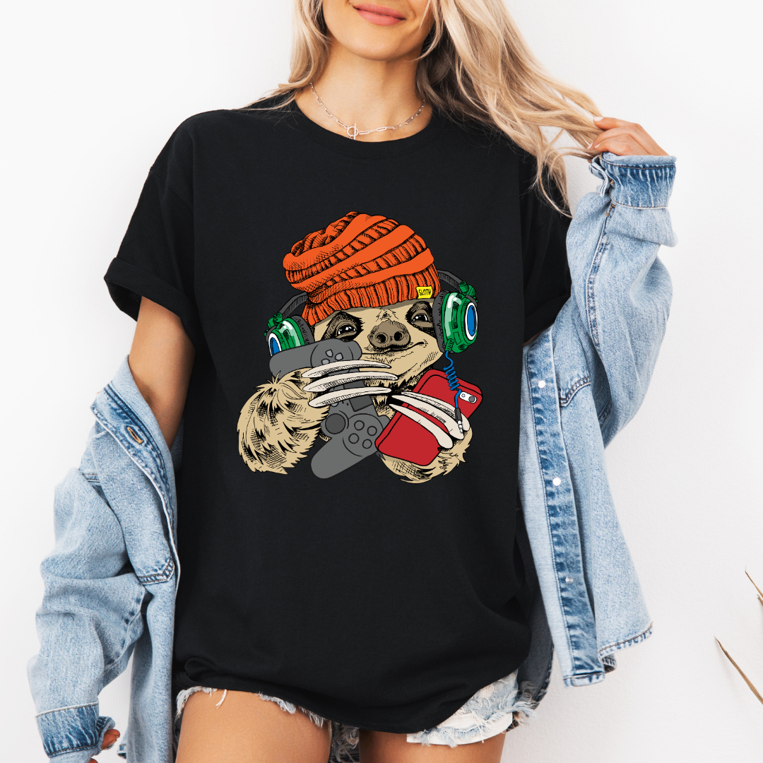 Female Model wearing a black Gamer Sloth soft graphic t-shirt, showcasing its unique design and comfortable fit from Coffee and Moo.