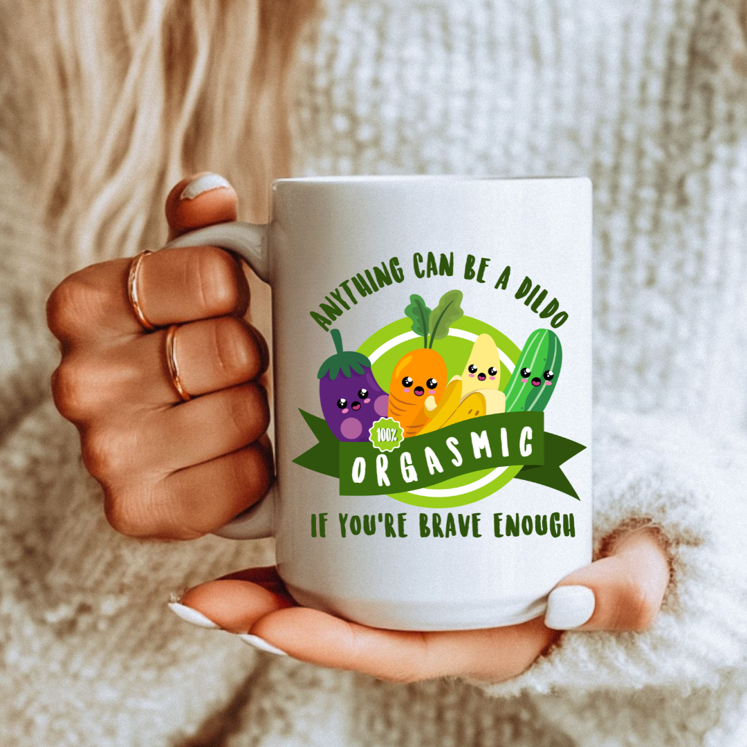 Female holding Orgasmic Veggies unique coffee mug, highlighting the outrageous veggie design, from Coffee and Moo.