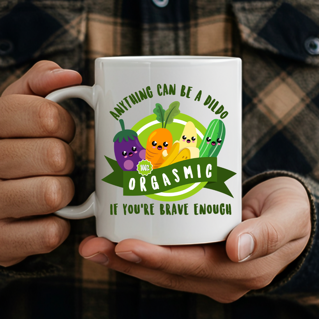 Male holding Orgasmic Veggies humorous coffee mug, showcasing the cheeky design and comfortable grip, by Coffee and Moo.