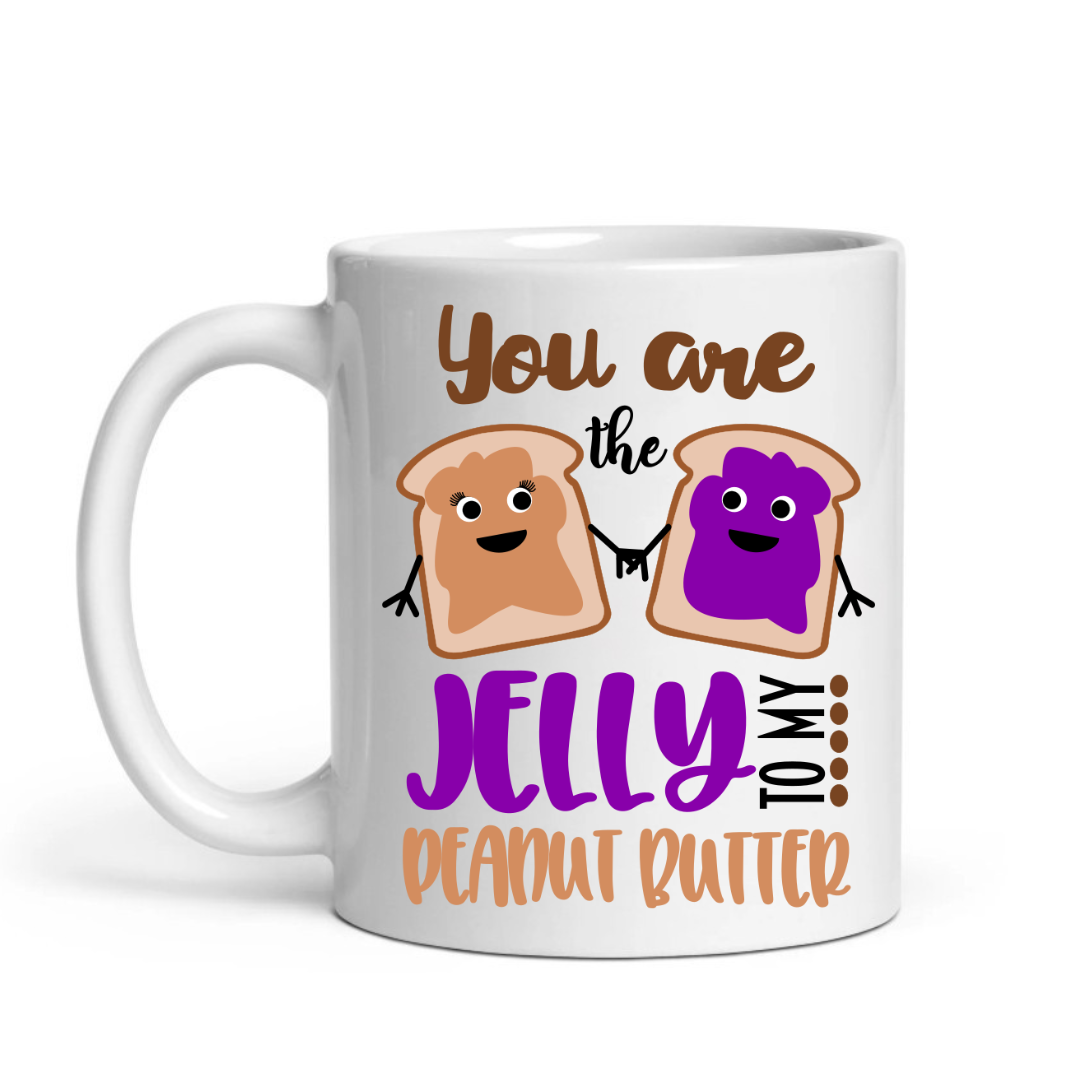 Peanut Butter & Jelly matching coffee mug set showing both "peanut butter" and "jelly" toast designs with "You are the jelly to my peanut butter" text, from Coffee and Moo.
