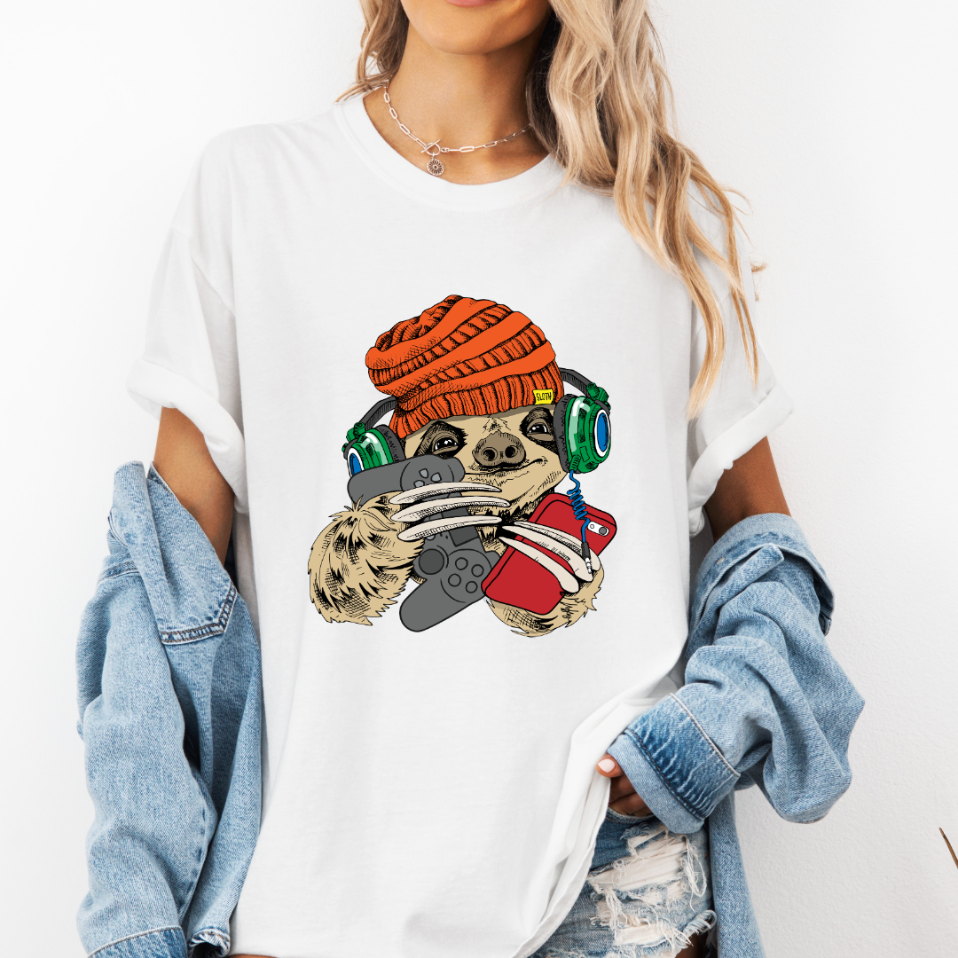 Female Model wearing a white Gamer Sloth soft graphic t-shirt, showcasing its unique design and comfortable fit from Coffee and Moo.