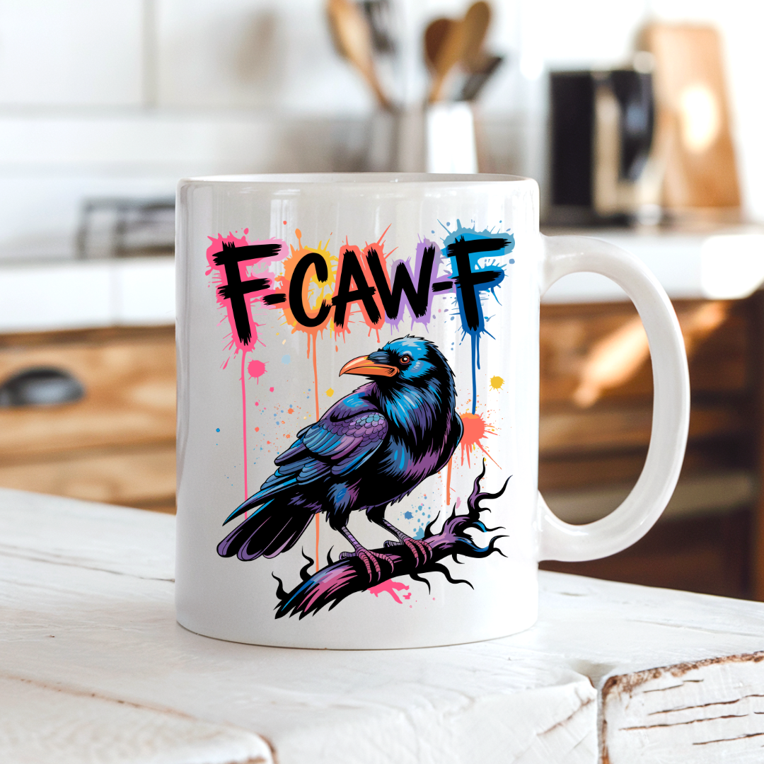 F-CAW-F Funny Crow coffee mug on a country kitchen bench, adding humour to a rustic setting, by Coffee and Moo.