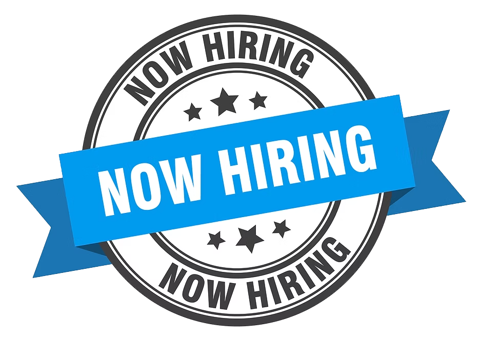Circular badge with black and white text that says "Now Hiring" repeated around the circle, with a blue banner across the middle that also says "Now Hiring" in bold white letters.