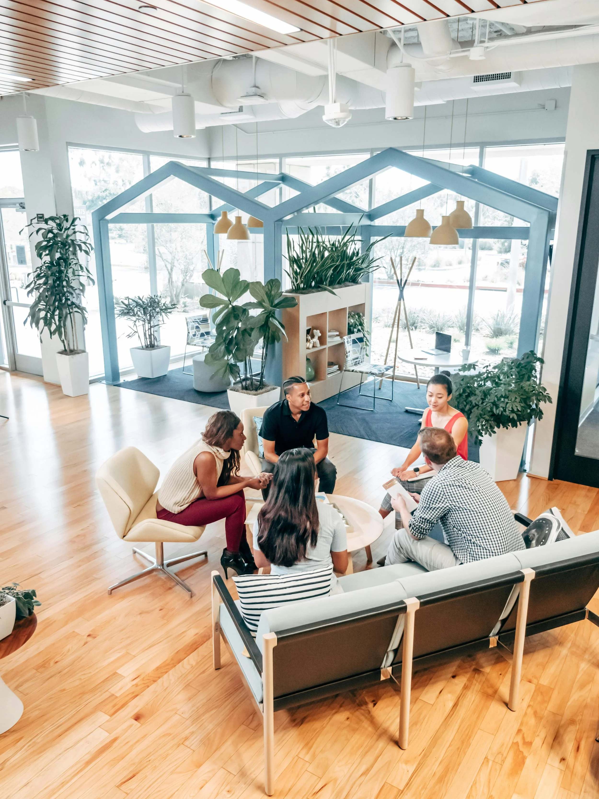 Product and marketing teams discussing the benefits of fractional product marketing leadership for small to mid-sized B2B technology & software companies