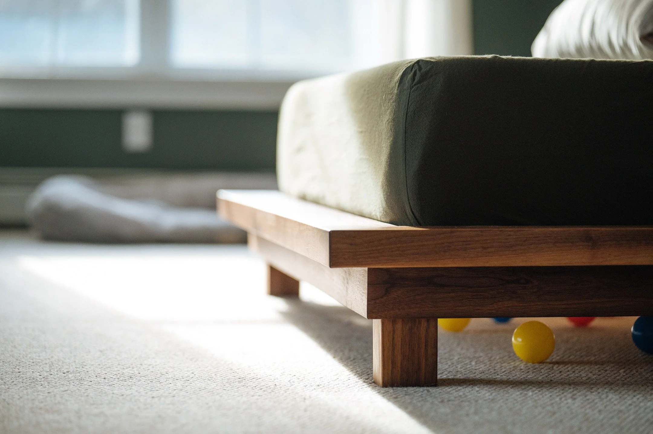 I've built three beds so far, because I just wasn't happy with the way the first two came out. Finally though, with the third one, I enjoyed the design enough to keep it. I love the detail of the legs and how the rectangles stack in the corner. 

And