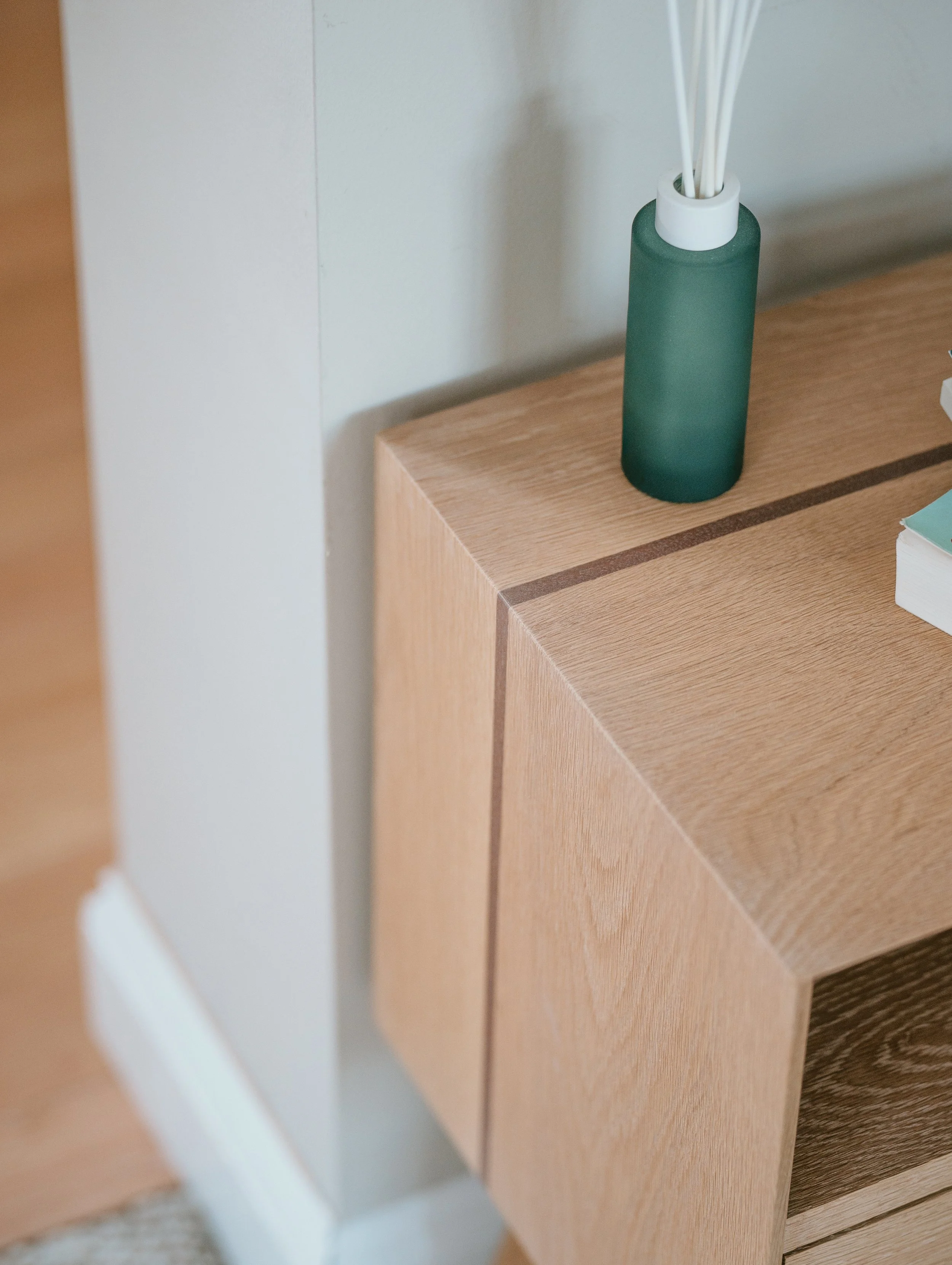 Contrasting wood species detail of nightstand