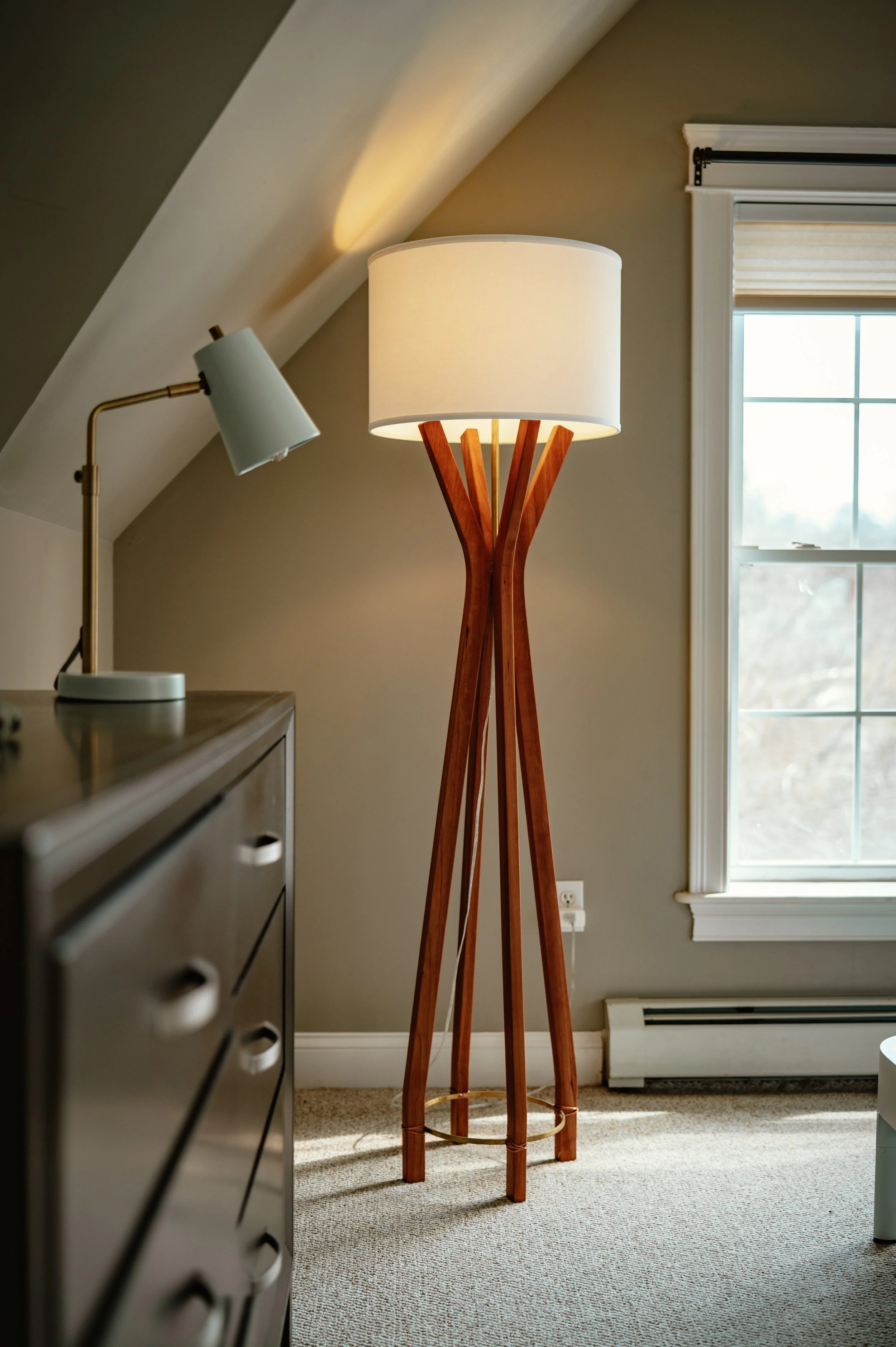 Cherry floor lamp with brass accents