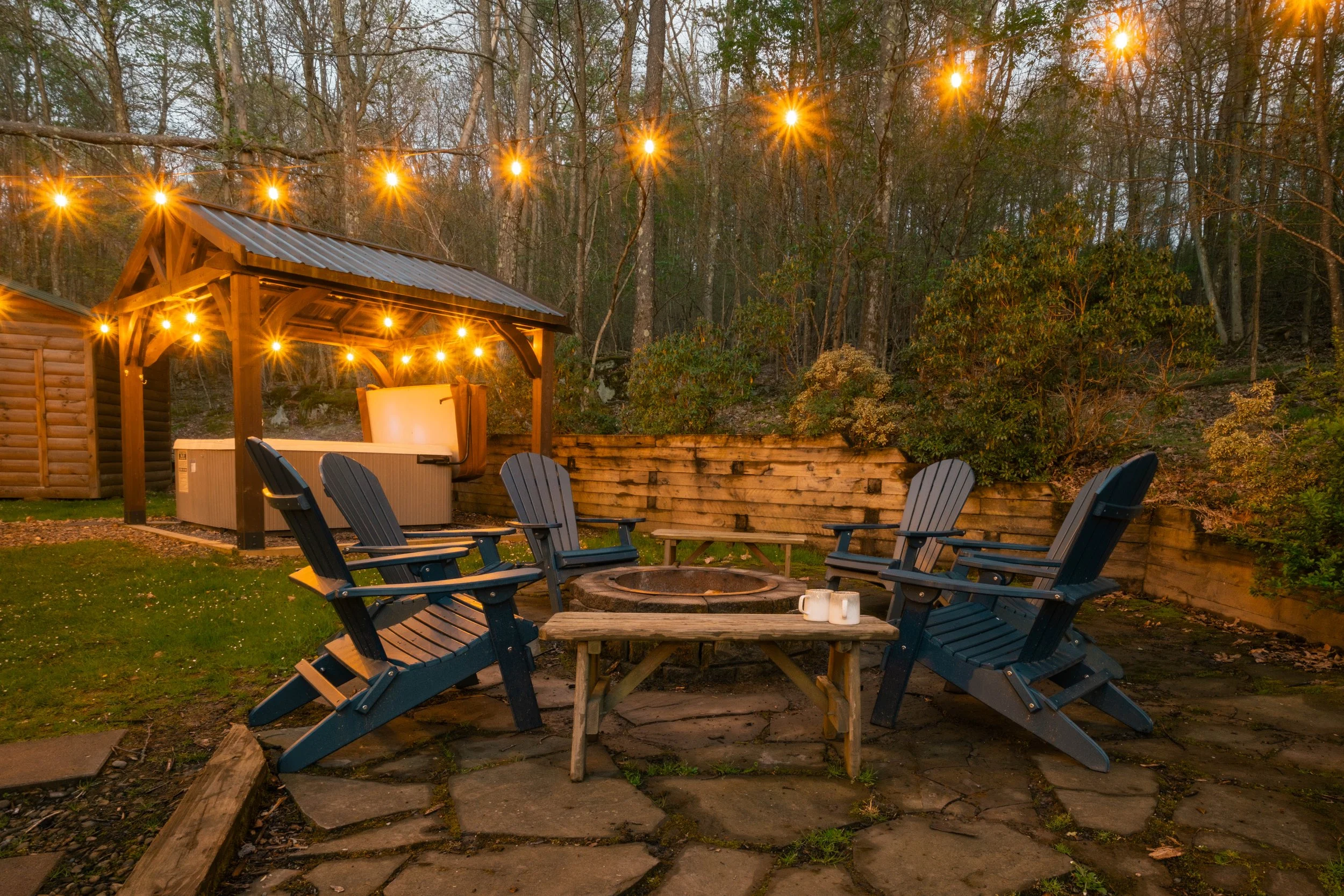 pine-and-paw-lodge-fire-pit-outdoor-adventure-twilight.jpg