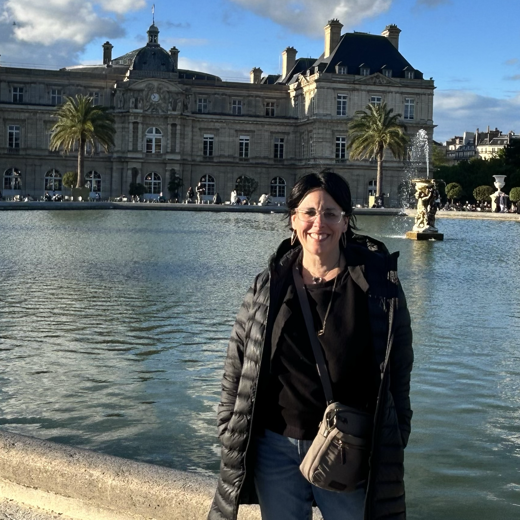 Meka standing in front of the Luxembourg Gardens in Paris France.