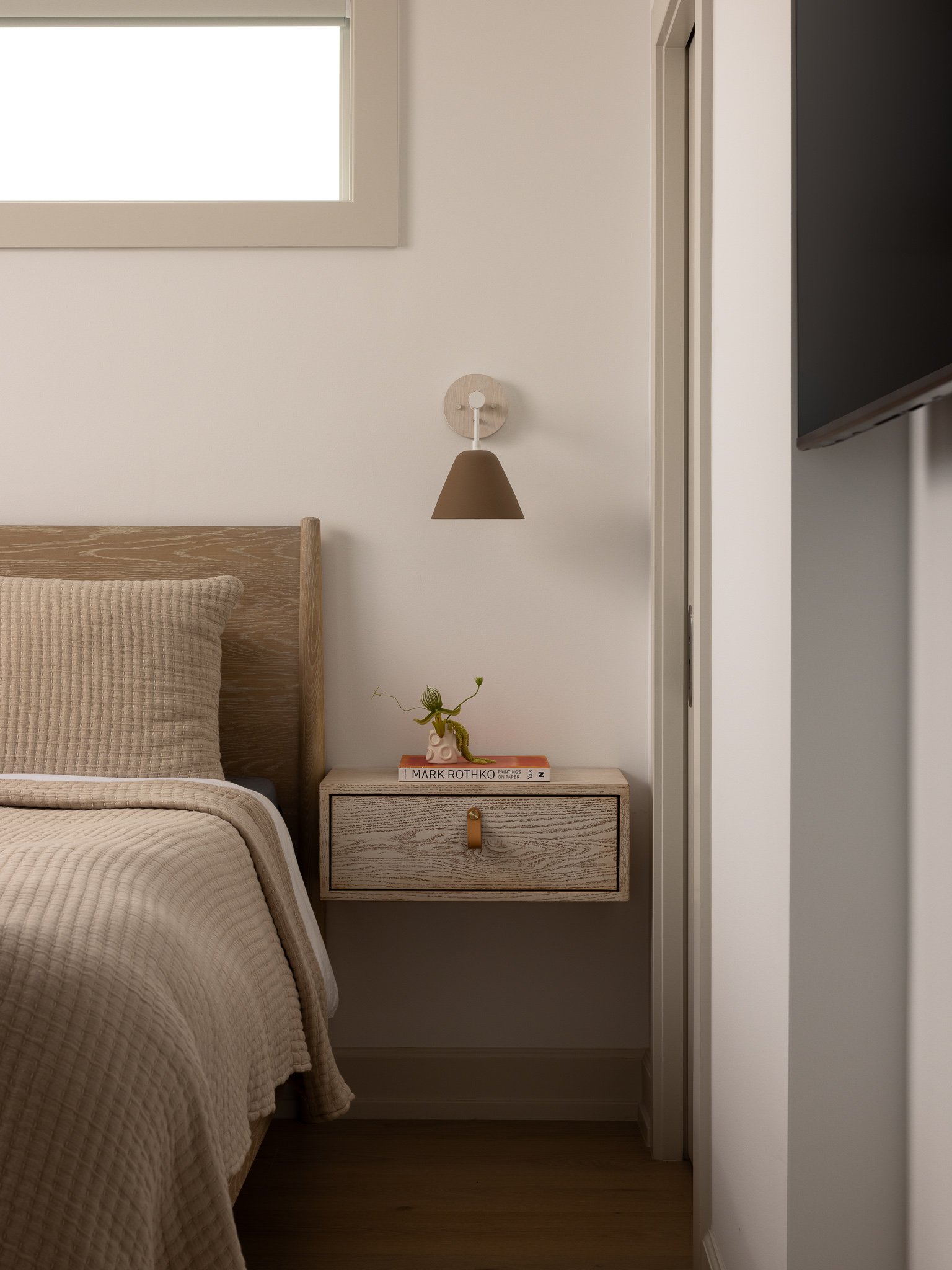 light oatmeal bedding and floating night stand