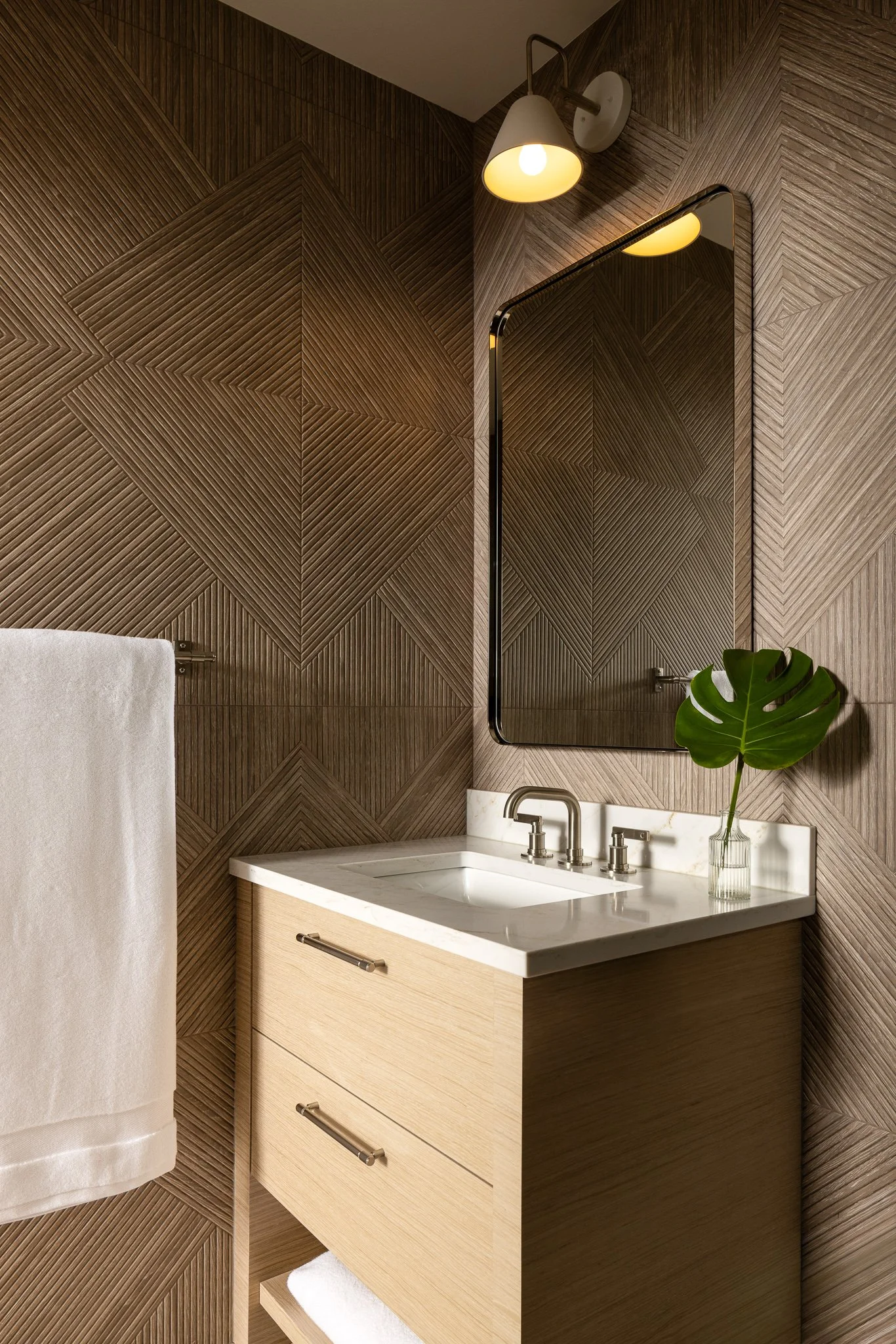 chevron square textured wall in a light bathroom