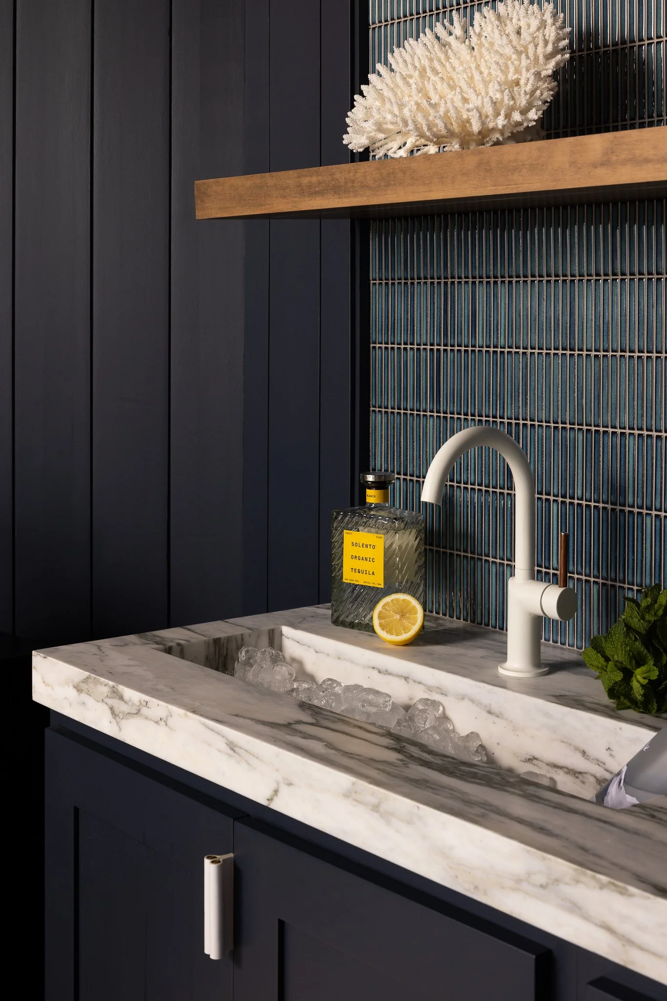marble bar and wooden floating shelves