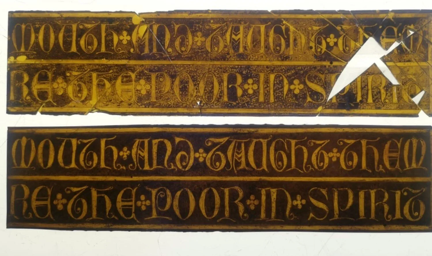 Two antique wooden signage boards with gold lettering, reading "No. 6 Main Entrance" and "No. 6 Main Exit", with decorative patterns and some damage or wear.