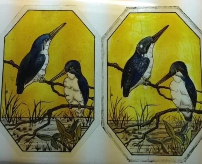 Two paintings of kingfishers on branches against yellow backgrounds, with one painting on the left and one on the right showing slight color and line variations.