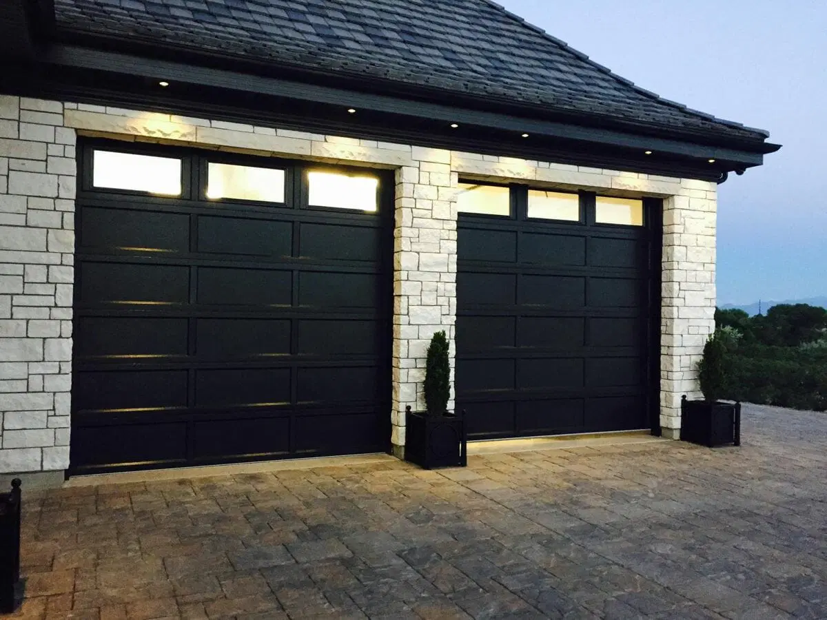 Two Black Recessed Panel Garage Doors