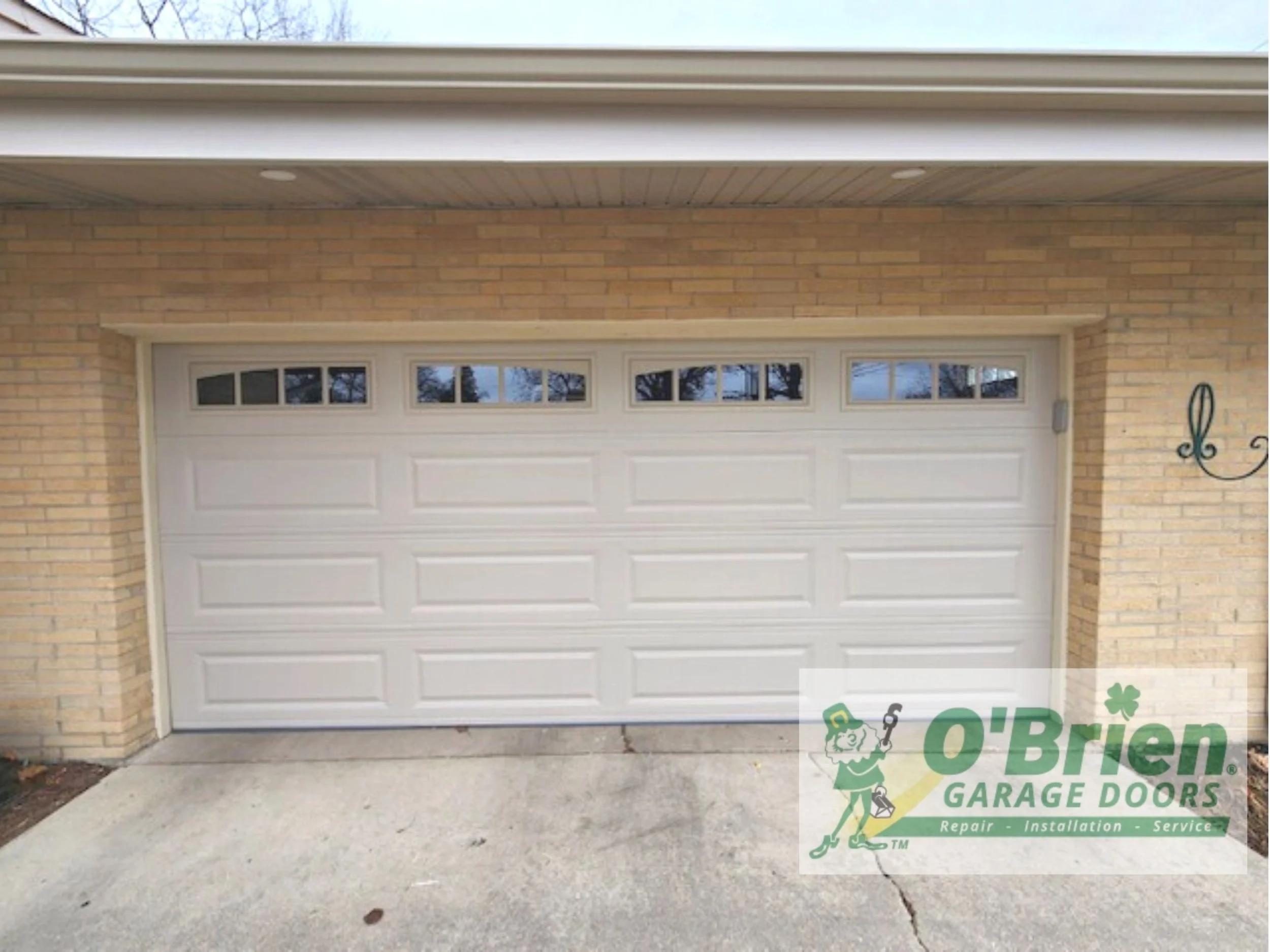 Light Brown Bricks With Beige Garage Door
