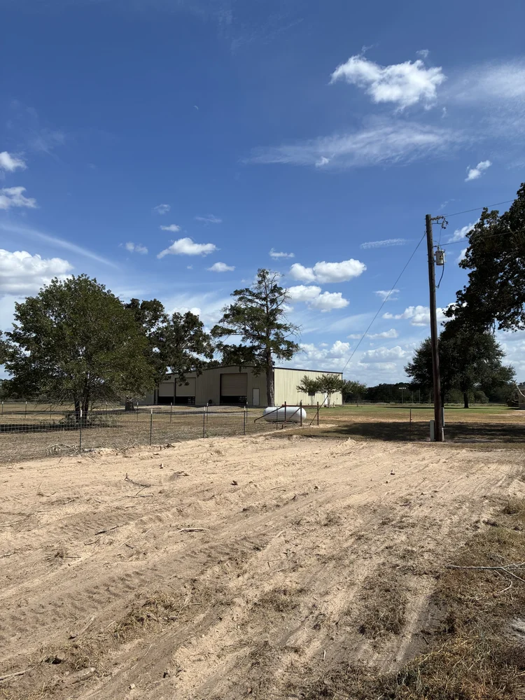Open area near barn after tree and root removal