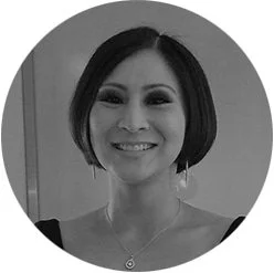 Silhouette of a person's head and shoulders, backlit to create a glowing outline against a dark background.