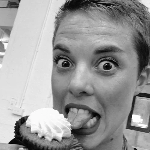 Silhouette of a person's head and shoulders with backlighting, creating a dark figure against a black background.