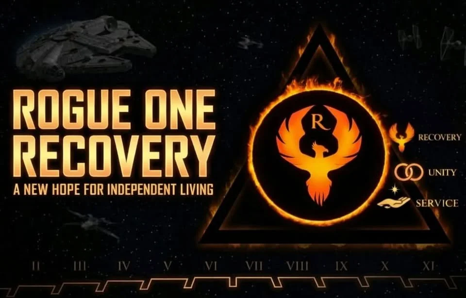 A promotional graphic for Rogue One Recovery featuring a starry space background, a spaceship, and a large black triangle with an orange flame-like circular emblem inside. The emblem has a phoenix with outstretched wings and the letter R at its center. To the right of the triangle are icons and words: a flame with tissue paper labeled 'Recovery', interlinked circles labeled 'Unity,' a hand with sparkles labeled 'Service,' and a bird silhouette labeled 'Recovery.' The text 'Rogue One Recovery' and the tagline 'A New Hope for Independent Living' are also present.