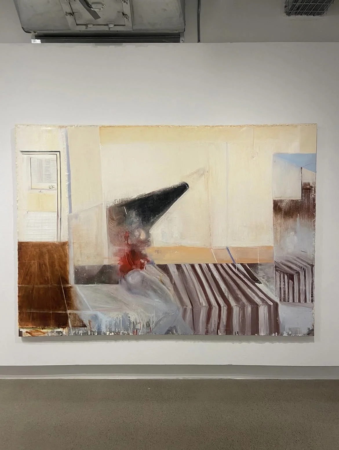 An abstract painting of an interior room with a desk, a computer monitor, and a chair. The painting uses loose brush strokes and a muted color palette focused on browns, beiges, and blacks.