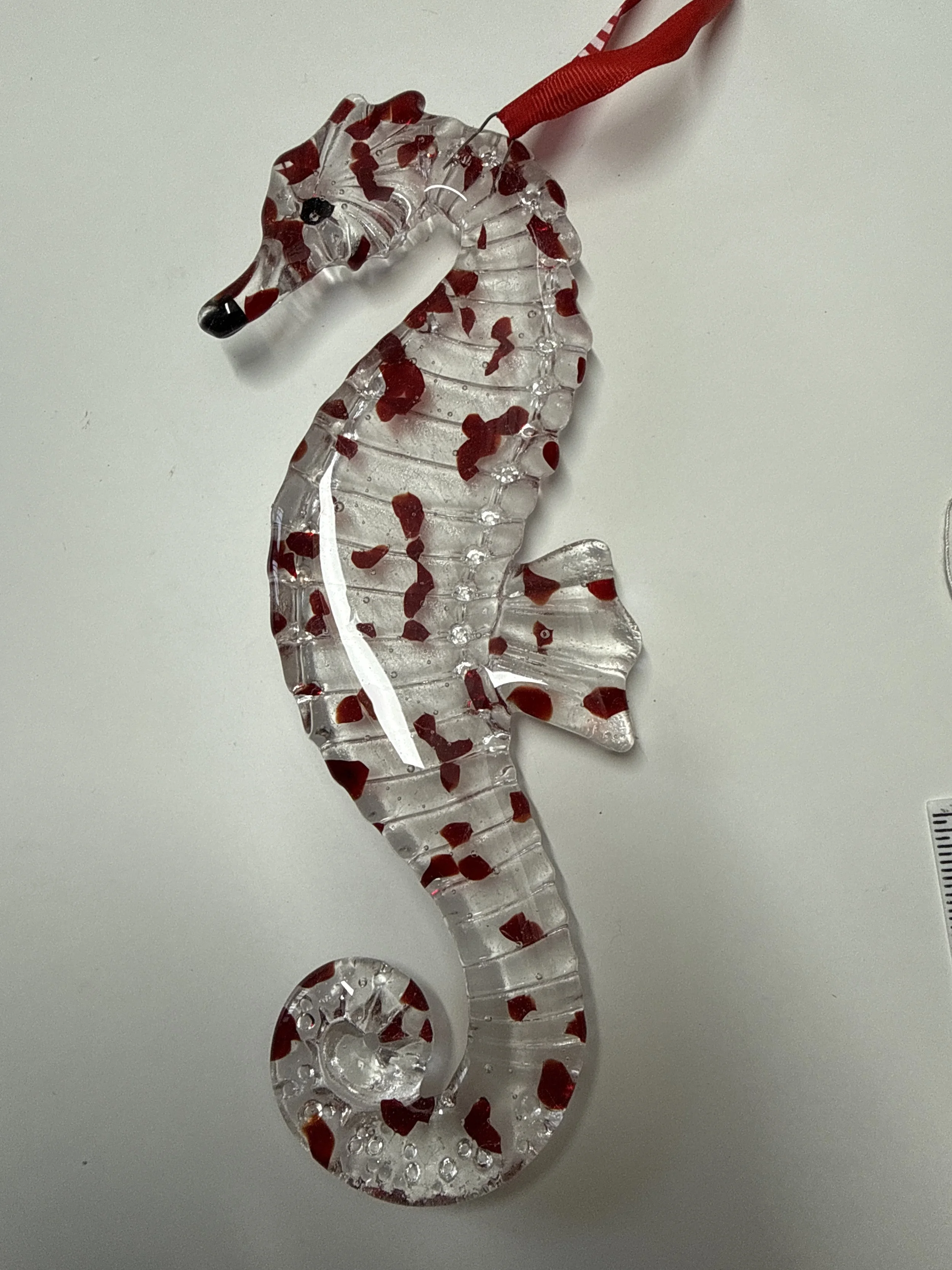 Red speckled Seahorse glass fused