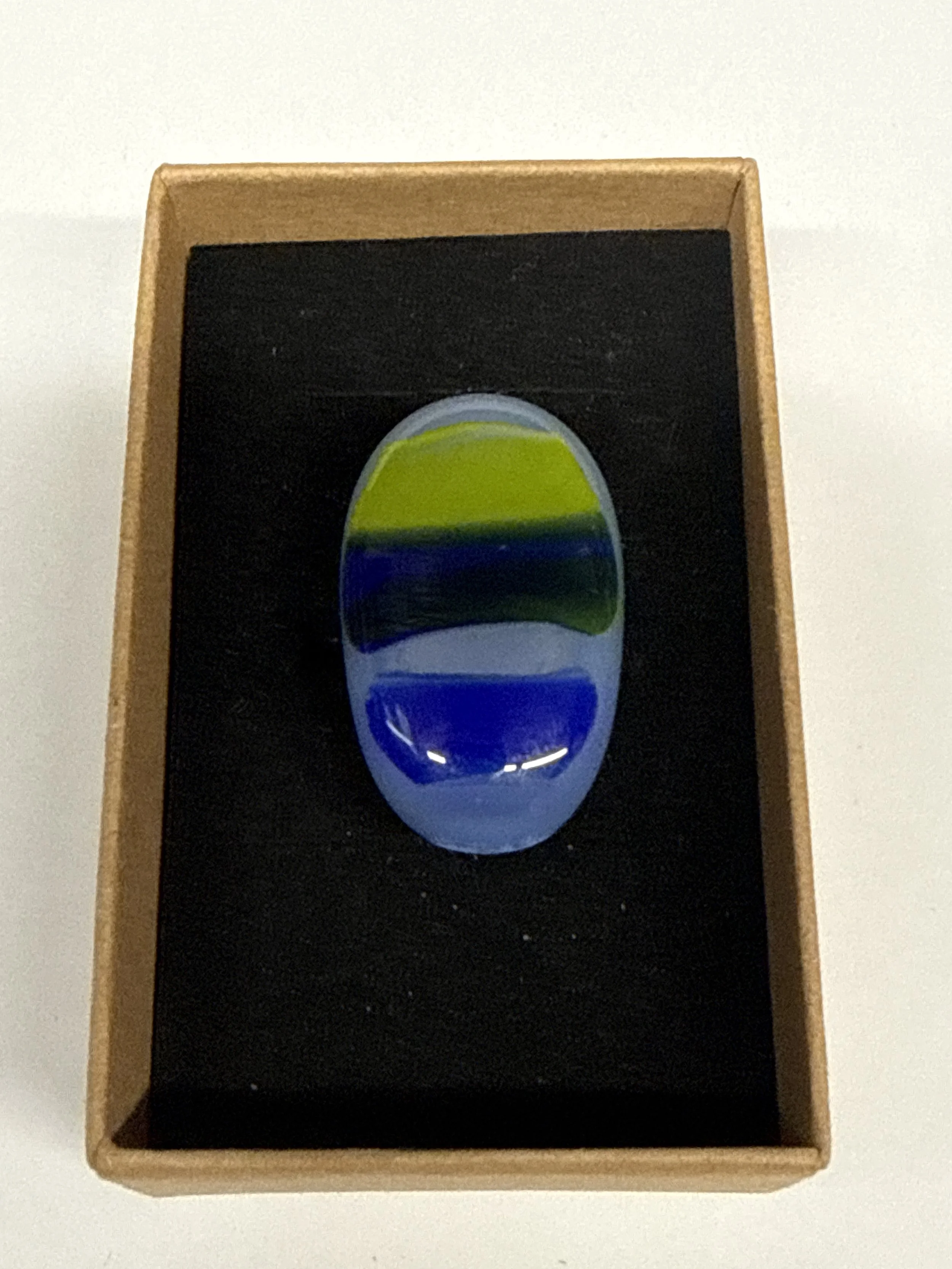 Oval shape blue with stripes