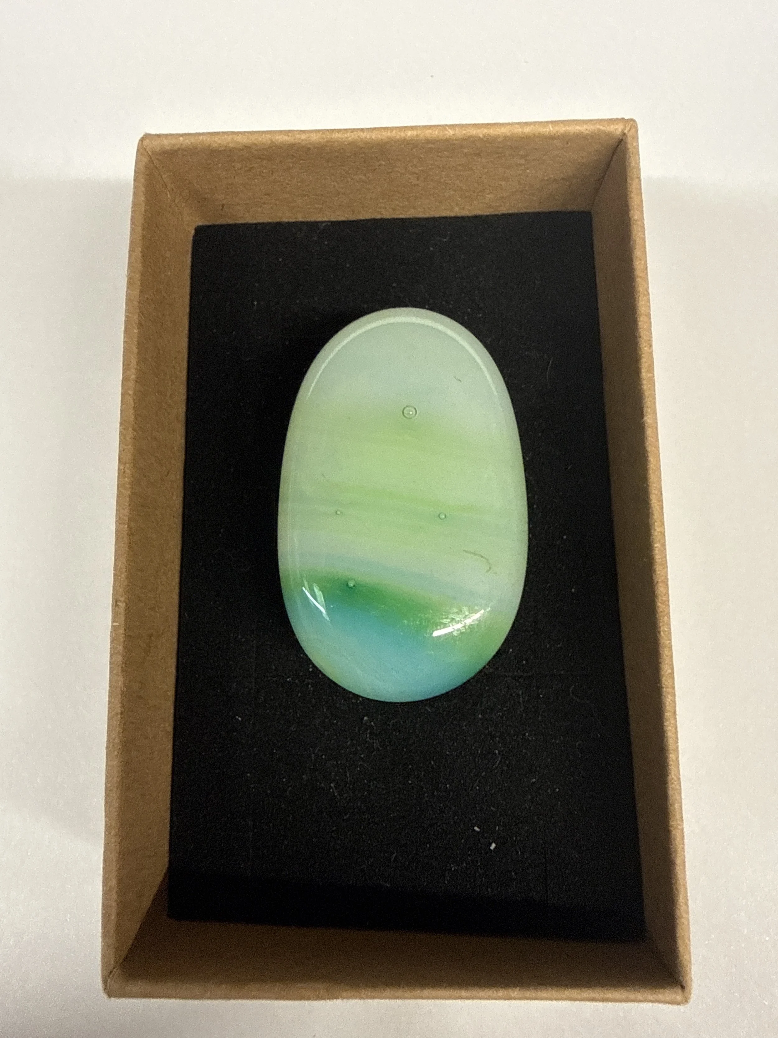 Oval shape Ring with green and yellow stripes