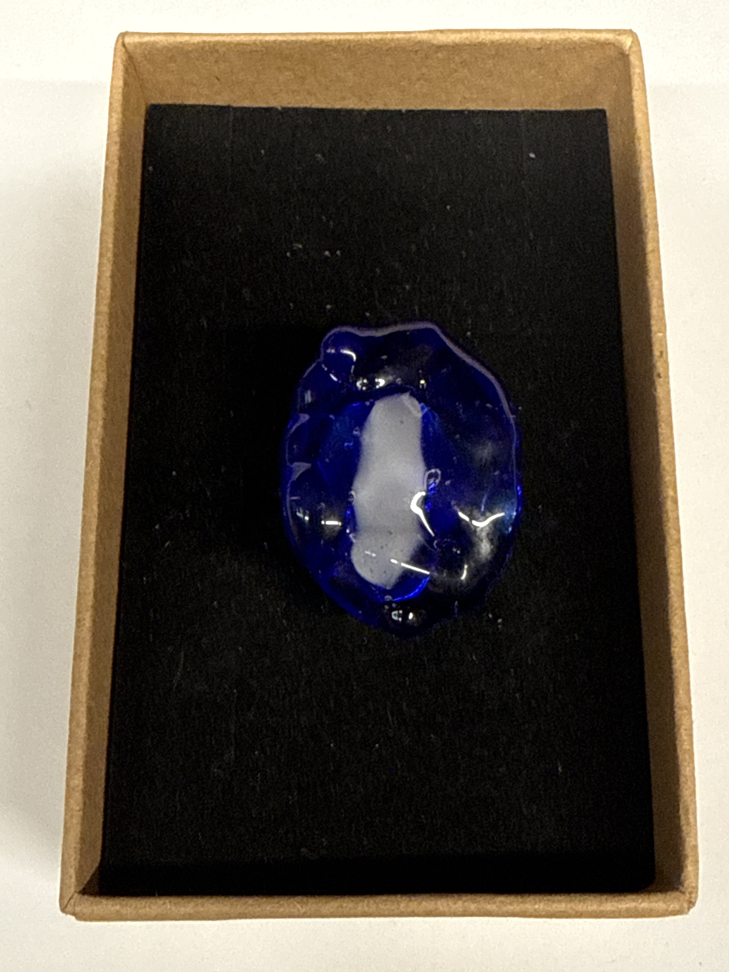 Oval shape Ring Blue with white centre