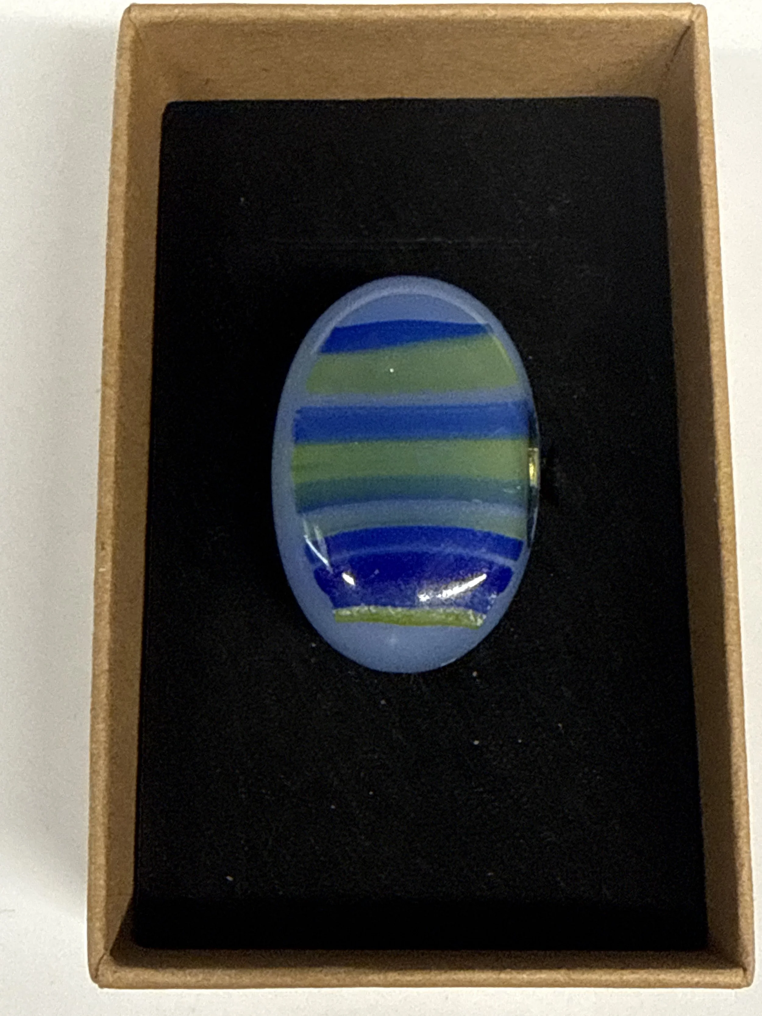 Oval shape blue with stripes