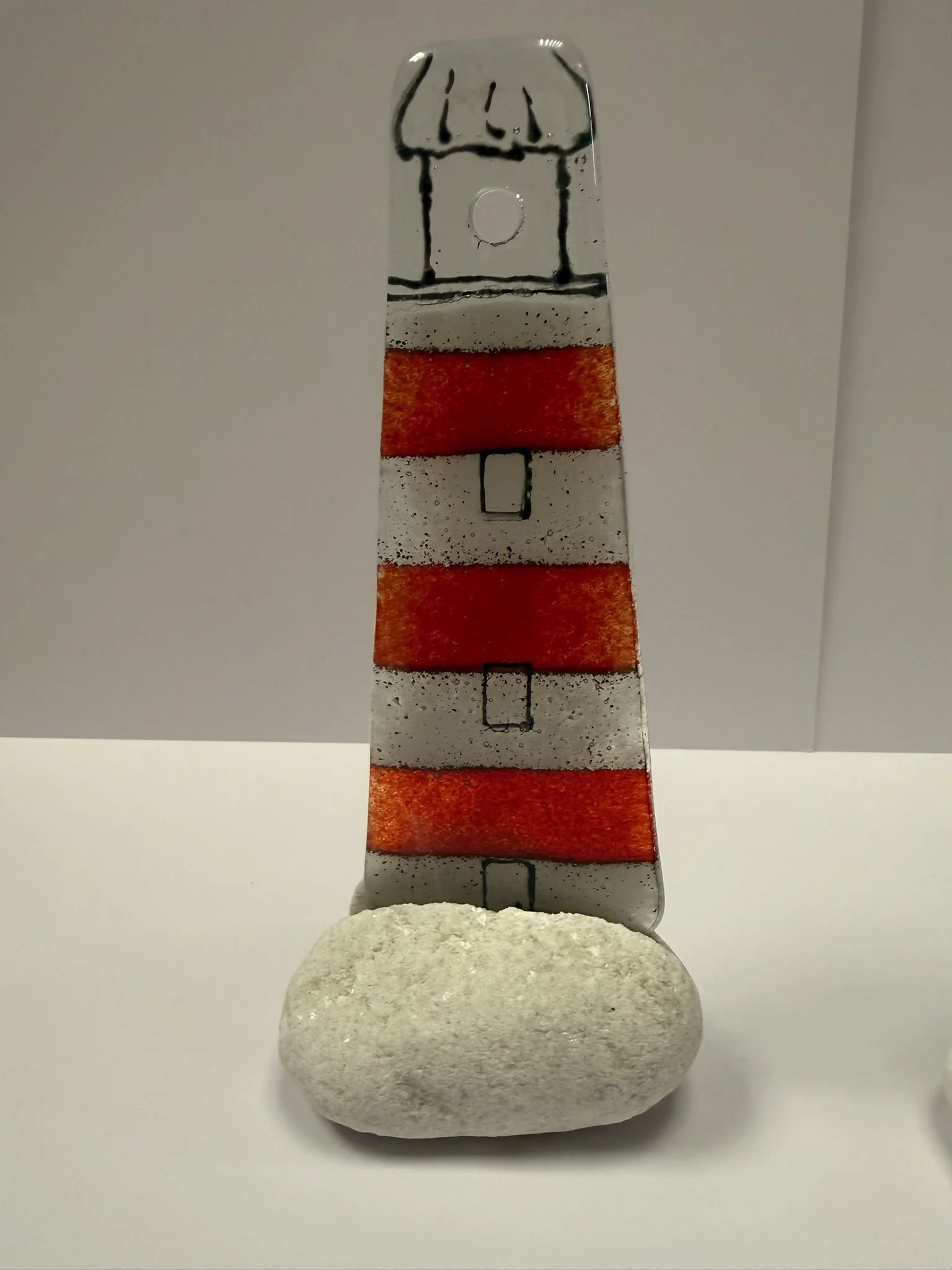 Red lighthouse on a coble stone x 1