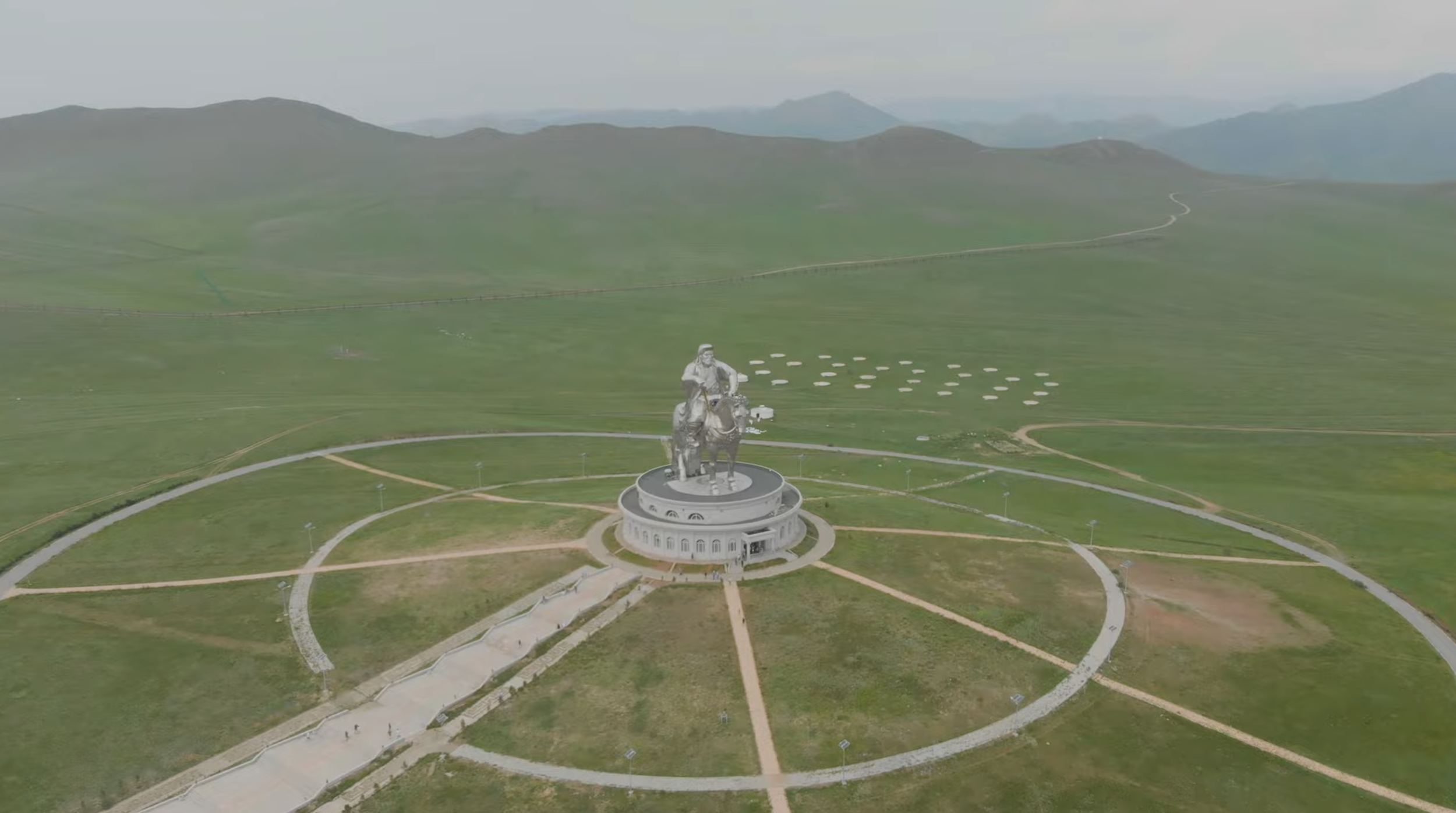 Aerial drone view of monument and surrounding landscape from above