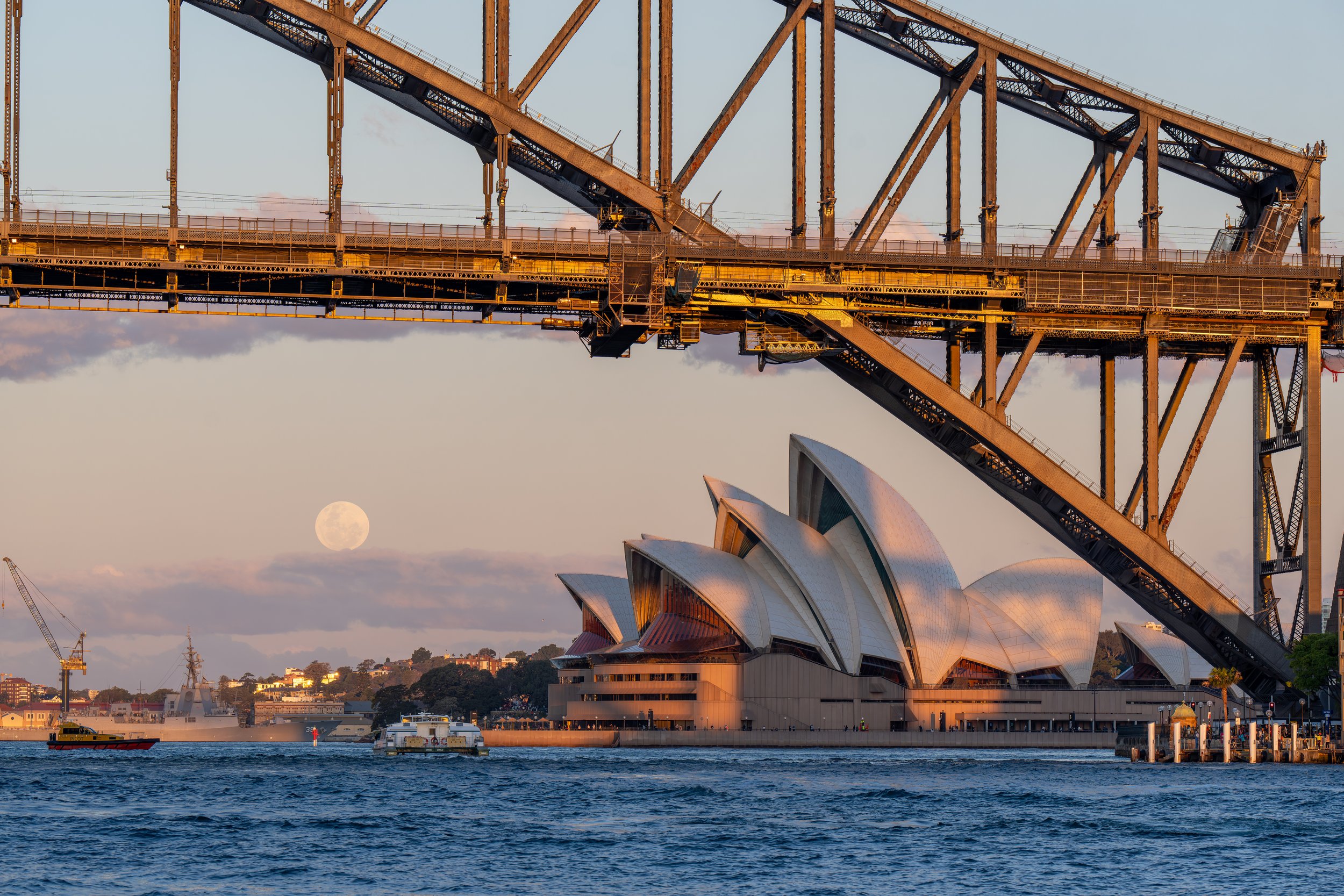 Sydney Harbour Bridge and Sydney Opera House cinematic harbour view and full moon