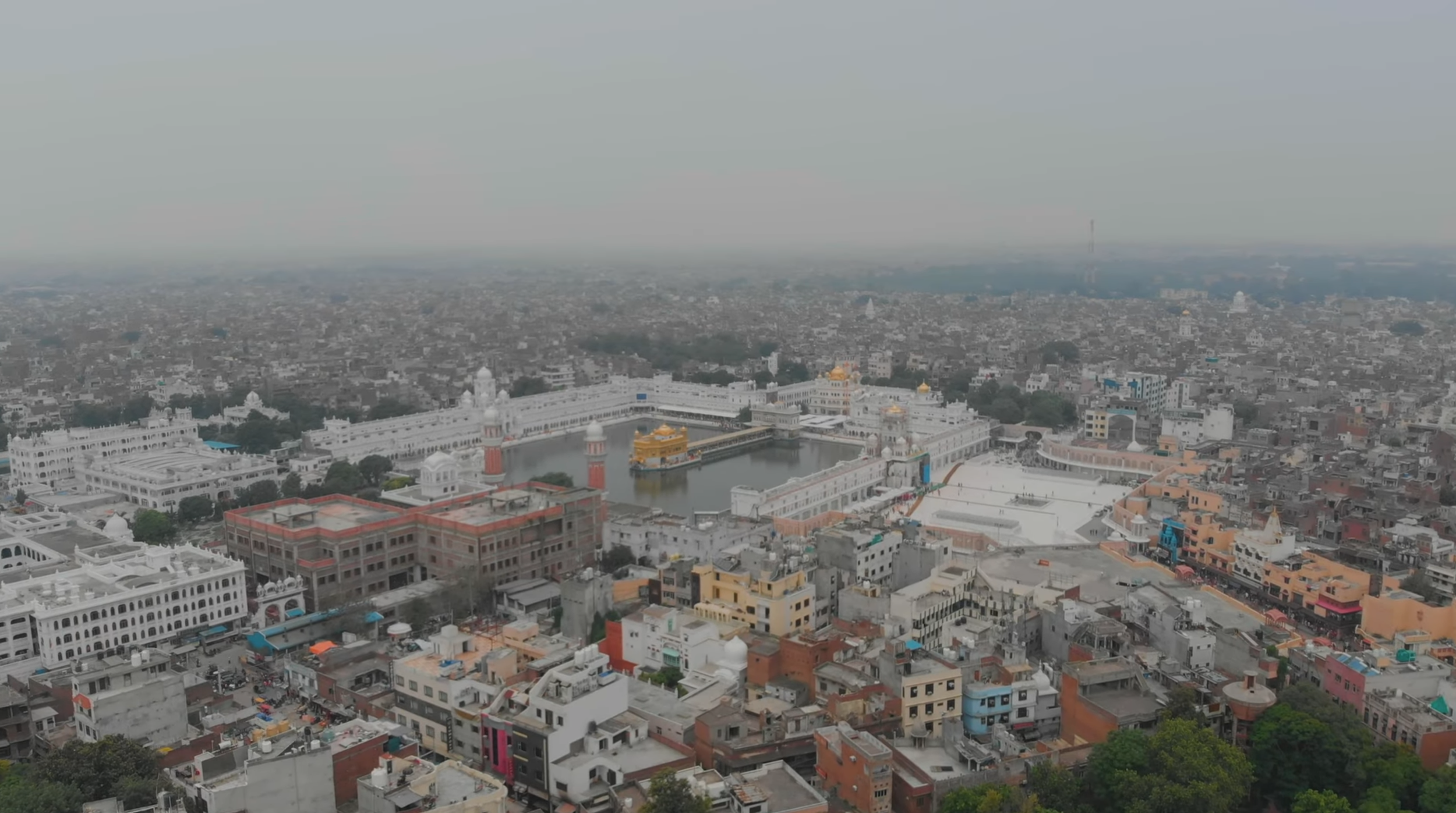 Aerial drone view of historic city architecture and urban landscape