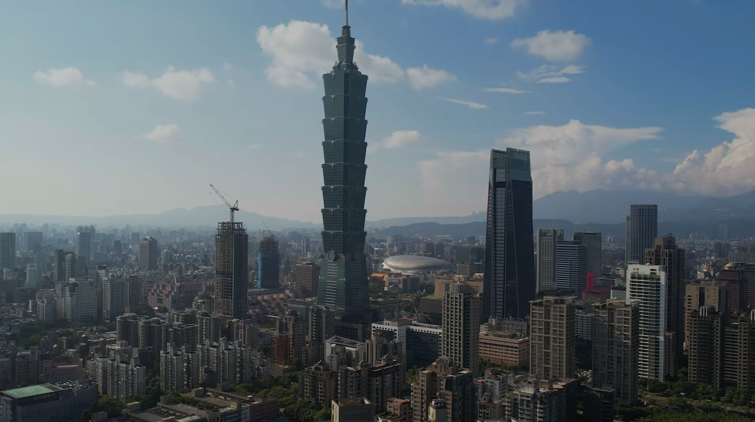 Drone aerial view of Taipei skyline with Taipei 101 skyscraper