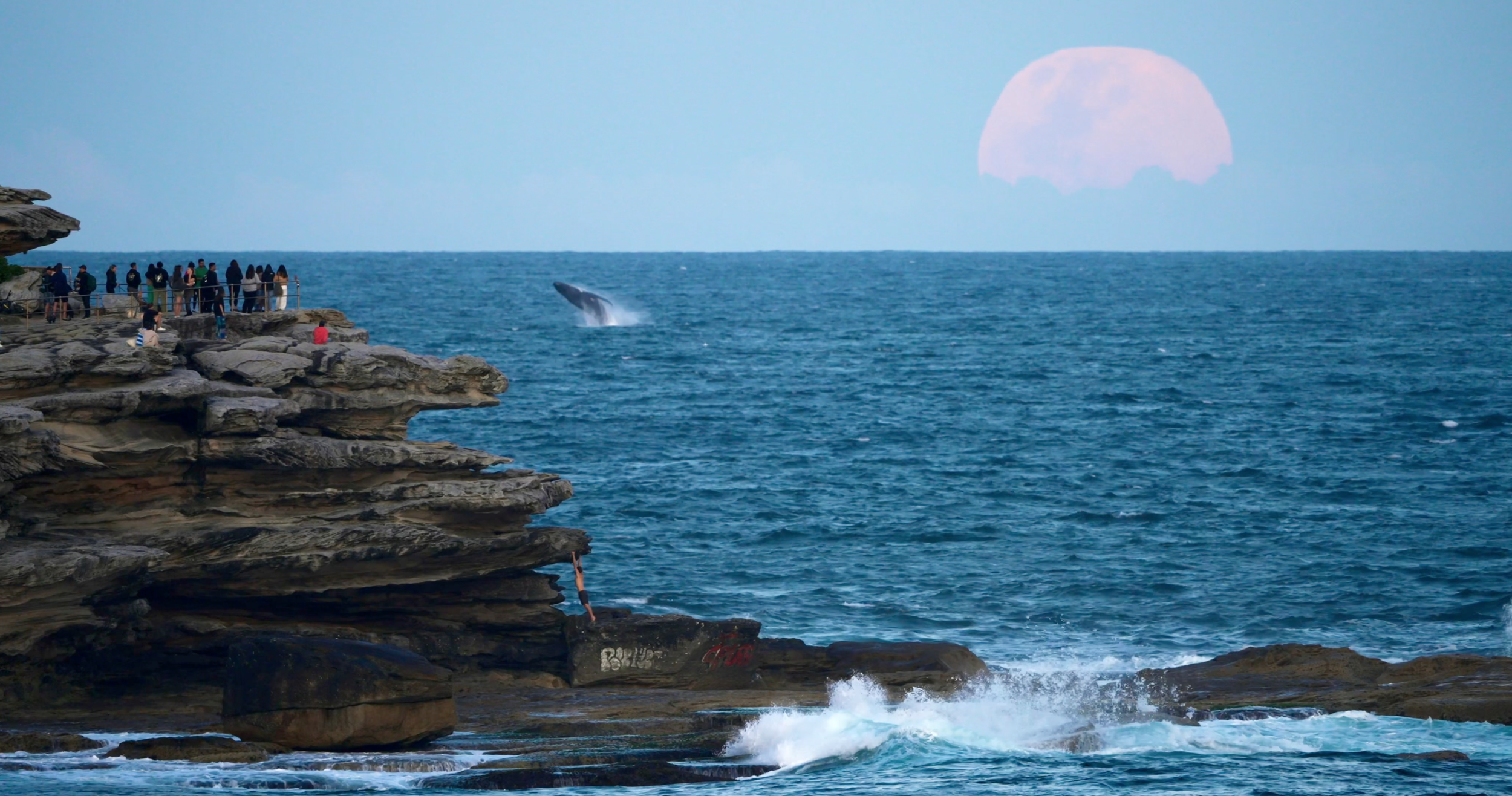 Ocean landscape filmed for documentary cinematography with moonrise over the sea